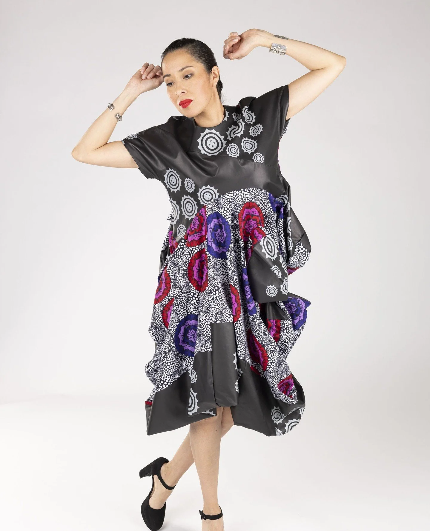 The &ldquo;Equilibrium&rdquo; dress is a one-of-a-kind zero waste garment made from a total of five yards of printed cotton and screen printed garment leather. ☀️☀️☀️⁠
⁠
Model: @haulisioux⁠
Photo: @okgf_imgs⁠
.⁠
.⁠
.⁠
#mvskoke #shopsmall #buynative #
