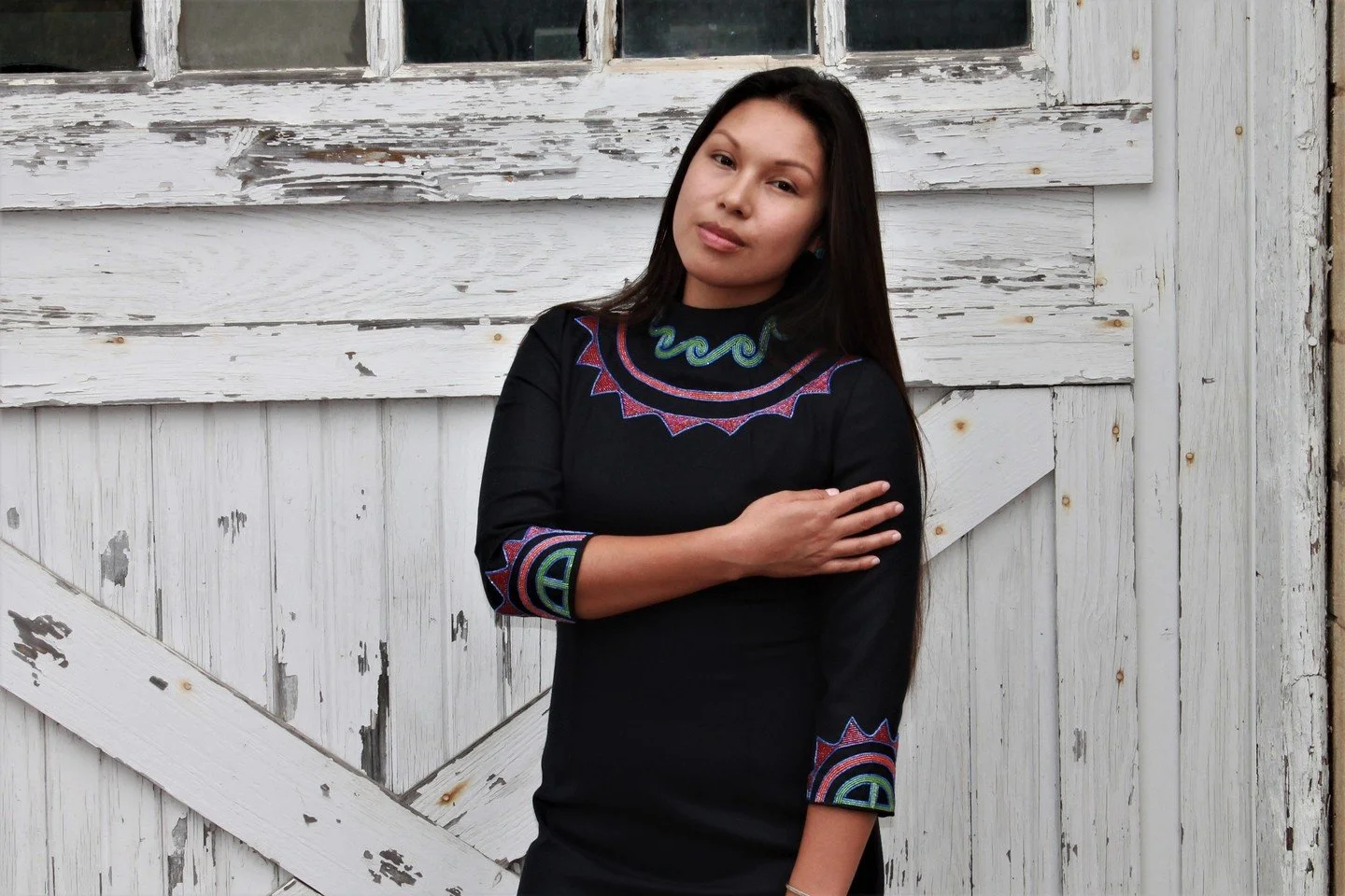 This one-of-a-kind wool crepe dress was specially crafted to feature hand-beaded sun circles 💫⁠
⠀⁠
Model: @macyloudthunder⁠
Photo: @kriswilson_602⁠
.⁠
.⁠
.⁠
#handbeaded #nativeart #mvskoke #buynative #muscogee #indigenous #shopsmall #indigenousart #
