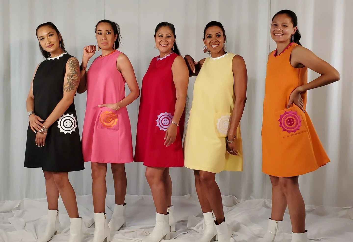 A rainbow of gorgeous looks, featuring the Sun Circles minidress 🌈🌈⁠
⁠
Models: @tdbrown75, @lorenkwaters, @dezbah.rose, @just_leahb and @haulisioux⁠
.⁠
.⁠
.⁠
#suncircle #nativeart #mvskoke #buynative #muscogee #indigenous #shopsmall #indigenousart 