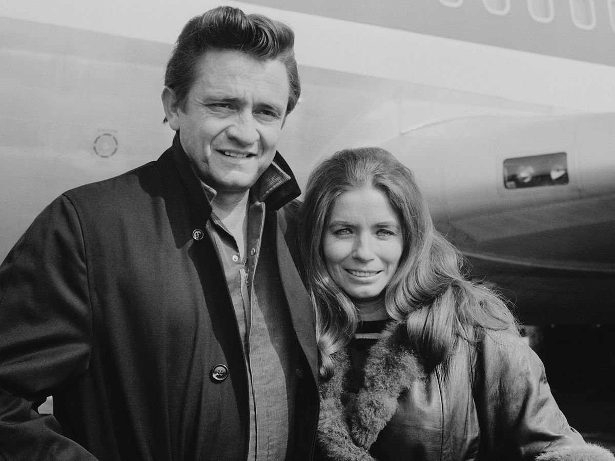 johnny-cash-1932---2003-with-his-wife-american-singer-and-actress-june-carter-1929---2003-at-heathrow-airport-uk-3rd-may-1968-photo-by-george-stroud_daily-express_hulton-archive_getty-images.jpg