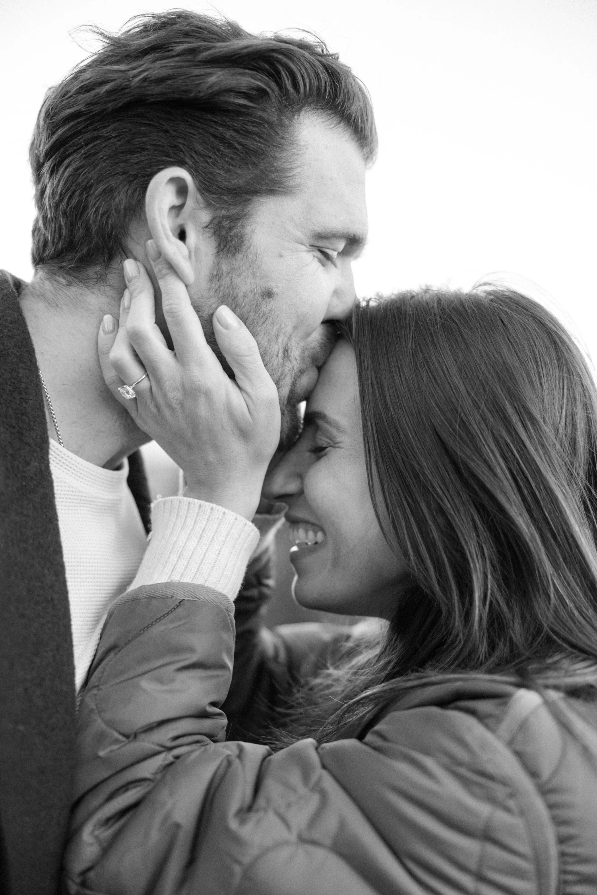 black and white photo of couple just engaged after their surprise proposal at Cedar Lakes Estate
