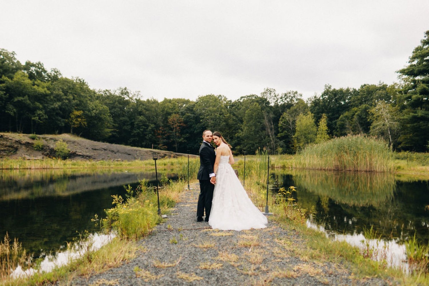 bride and groom in the middle of the quarry at Gather Greene