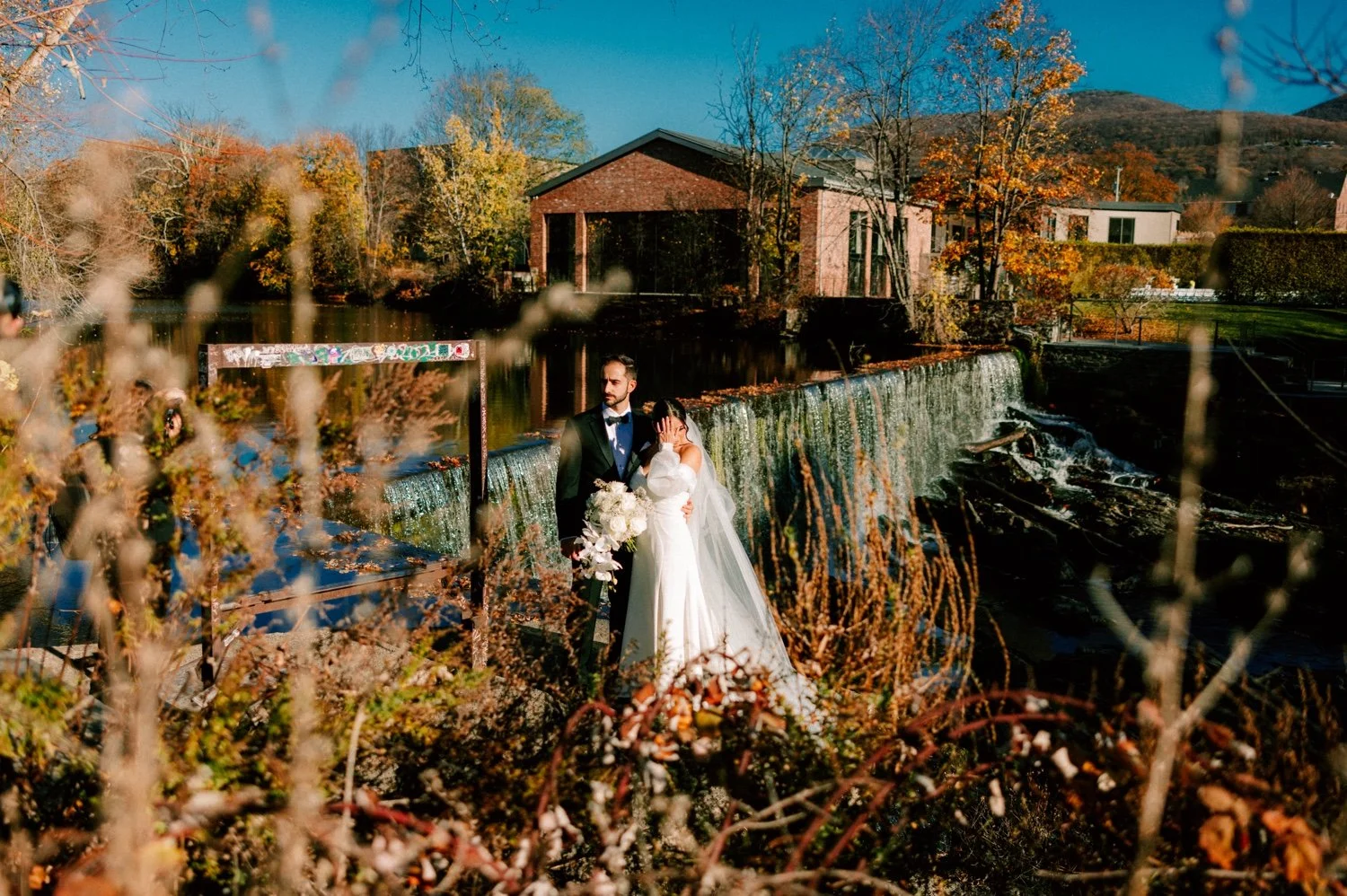editorial wedding photograph of couple at beacon falls in front of the roundhouse venue
