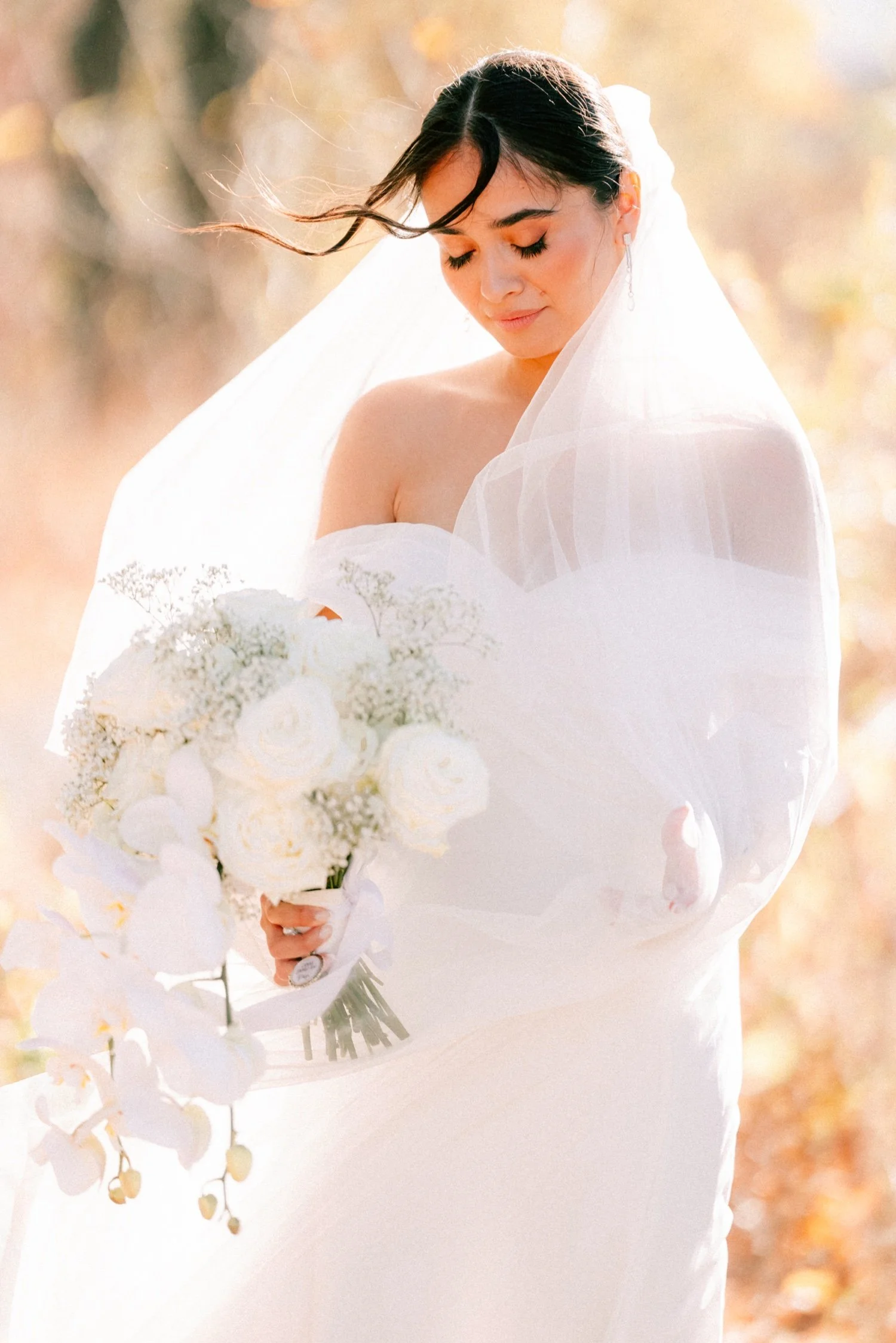 documentary photograph of bride at the roundhouse with wind in her hair