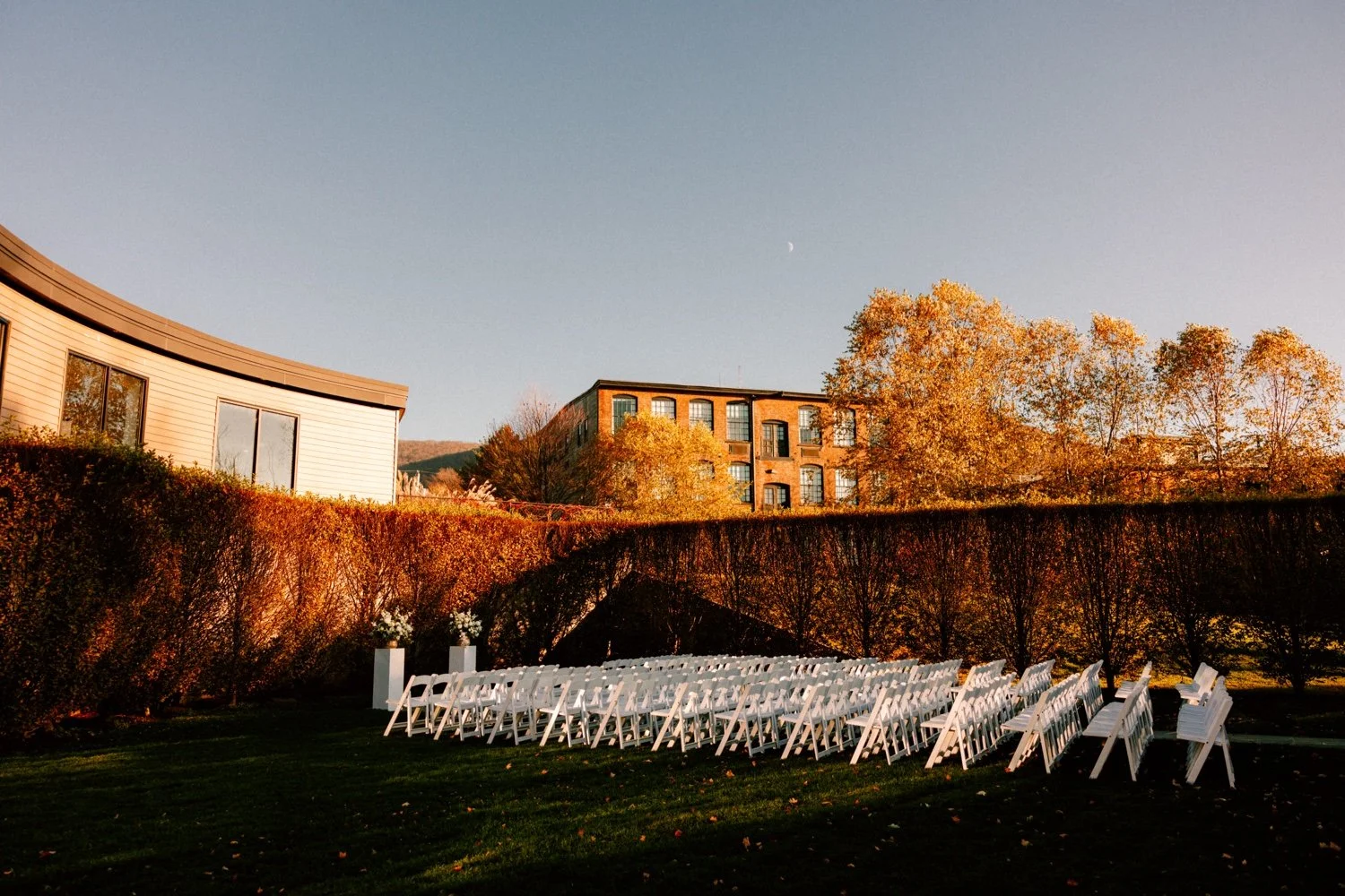 outdoor autumn wedding ceremony at the roundhouse in beacon ny