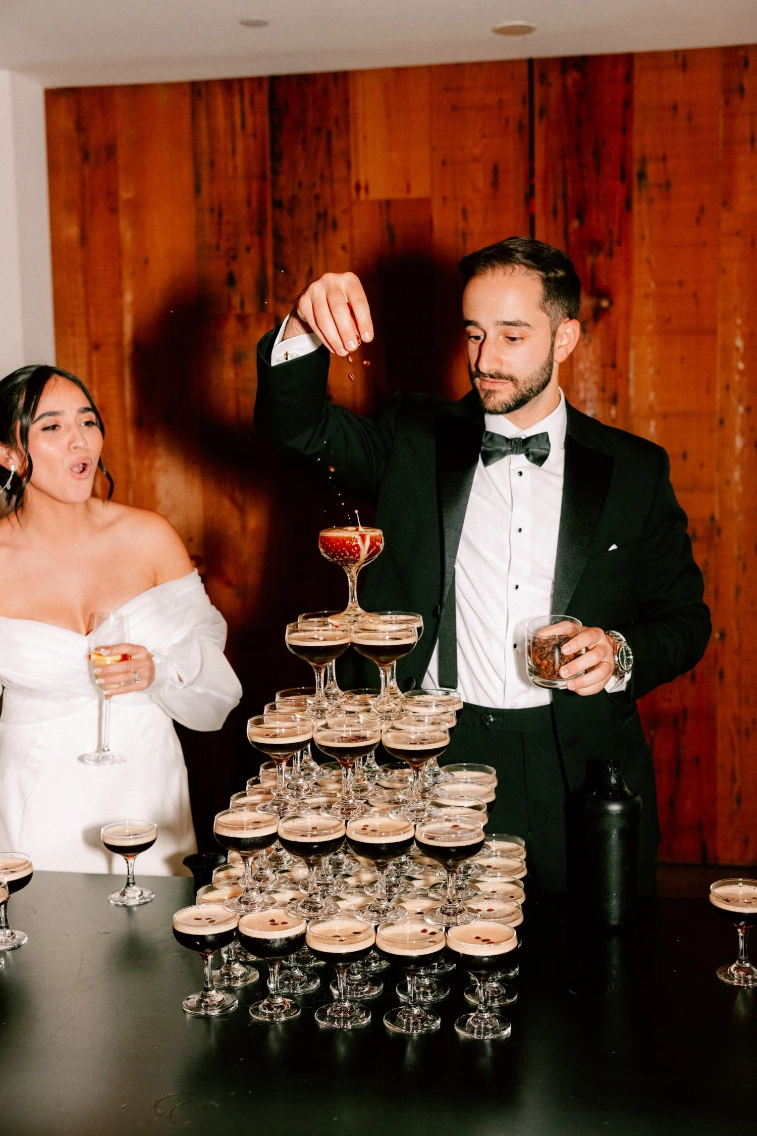 groom tops espresso martini tower with beans at the roundhouse