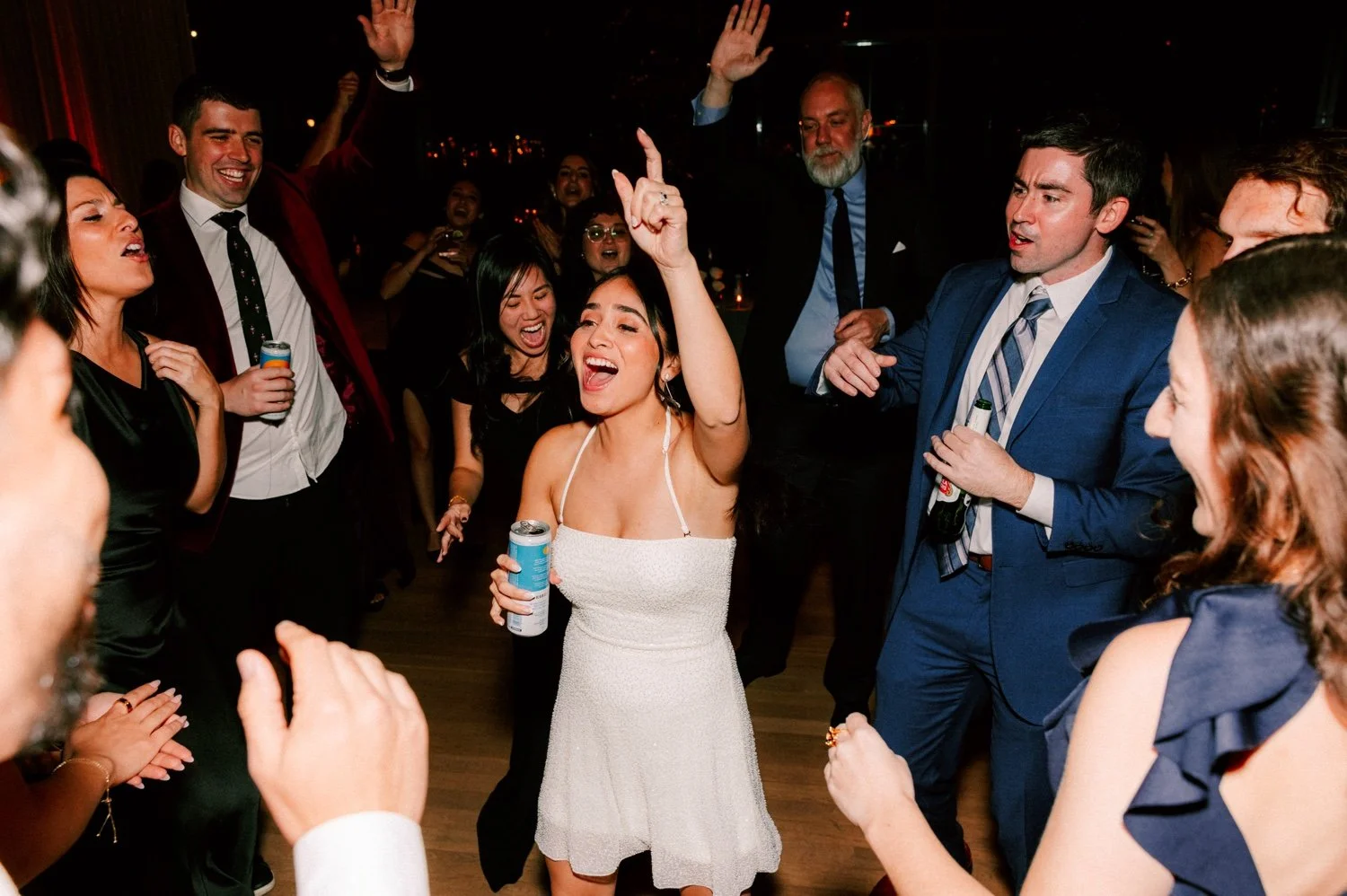 bride sings during her reception at the roundhouse