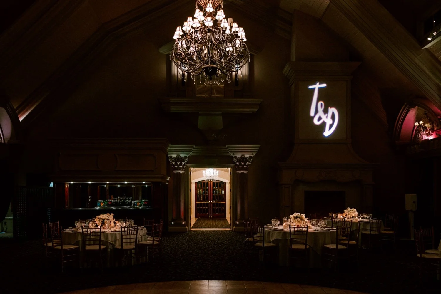 wedding reception flowers and uplighting at the ashford estate