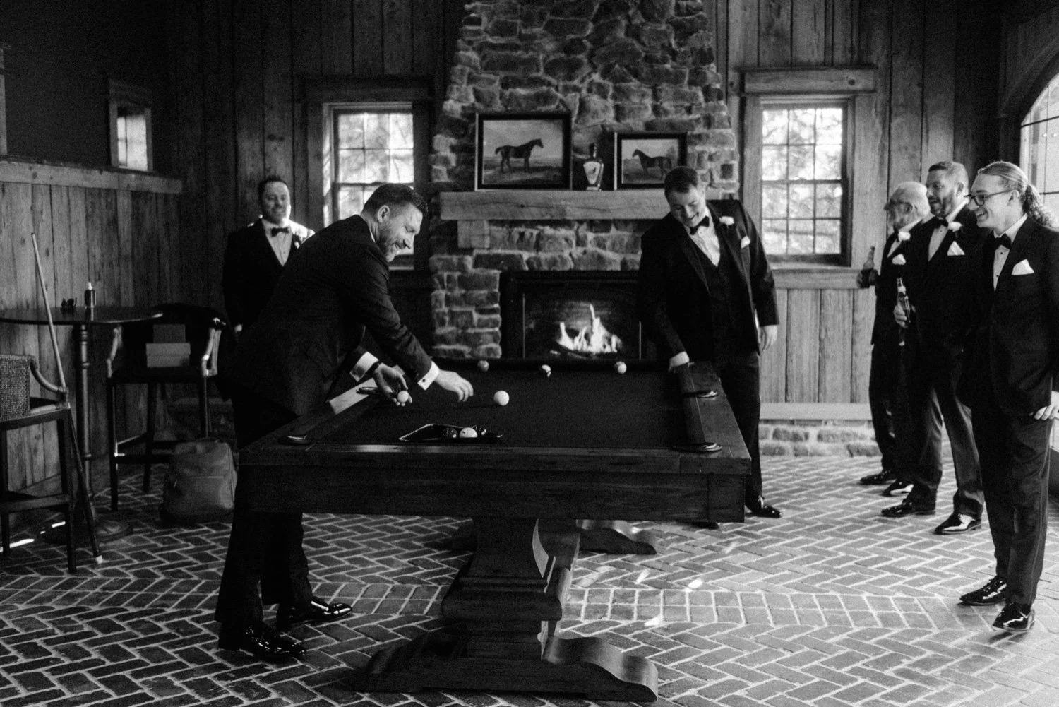 groom and groomsmen playing pool at the ashford estate