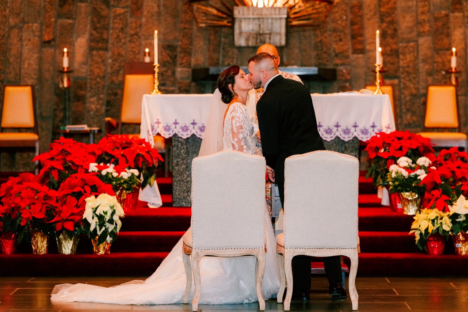  wedding couple have first kiss and husband and wife during church ceremony in Newburgh, NY 