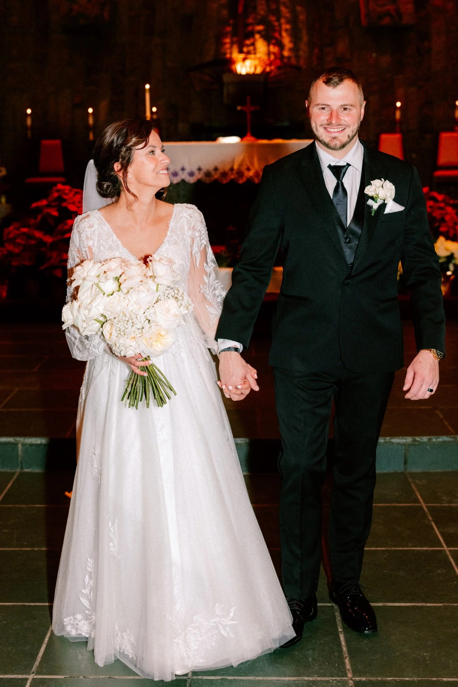  portraits of wedding couple at church altar after their ceremony in newburgh ny 