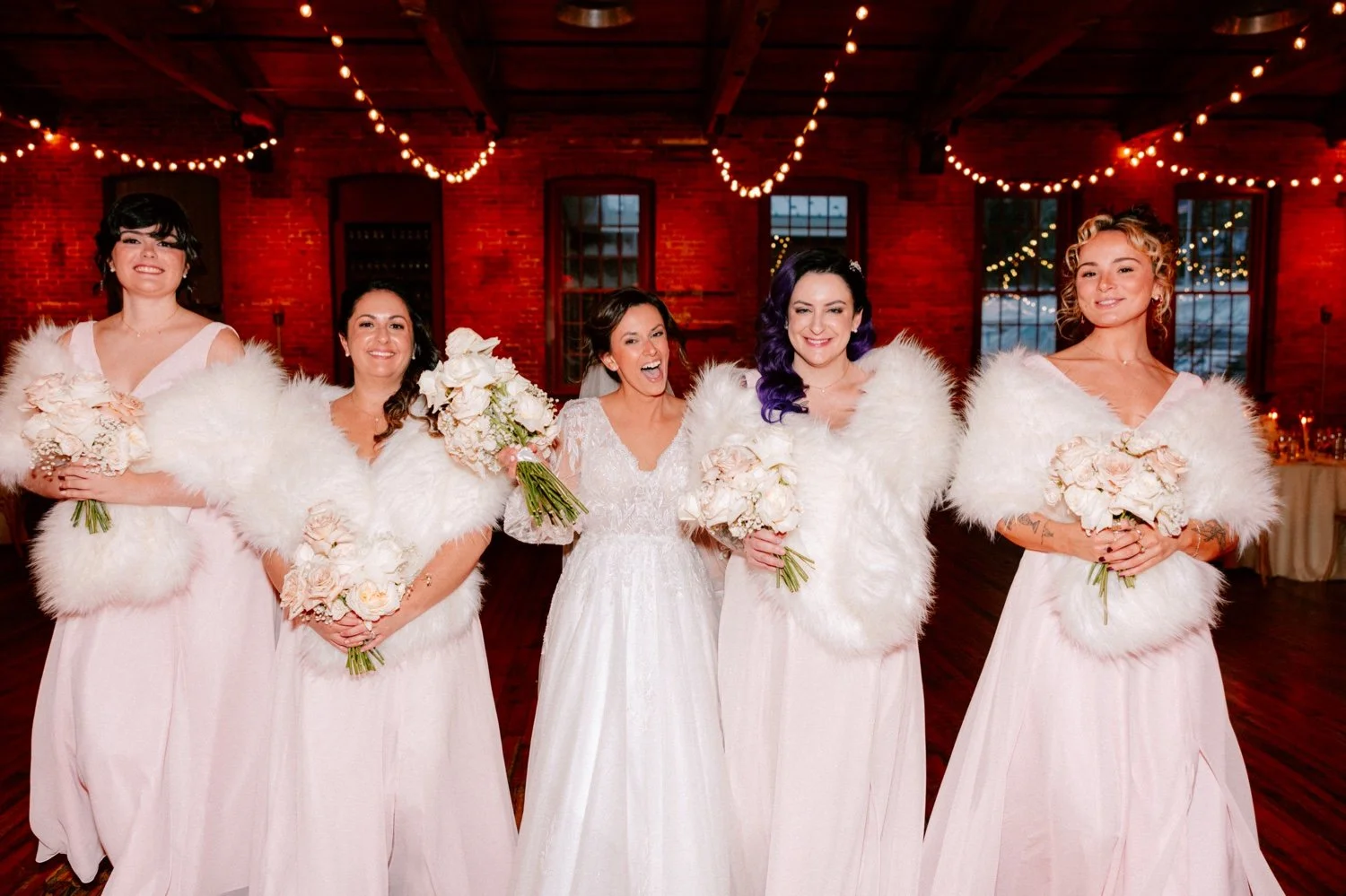 bridal party photos taken inside city winery hudson valley on winter wedding day 