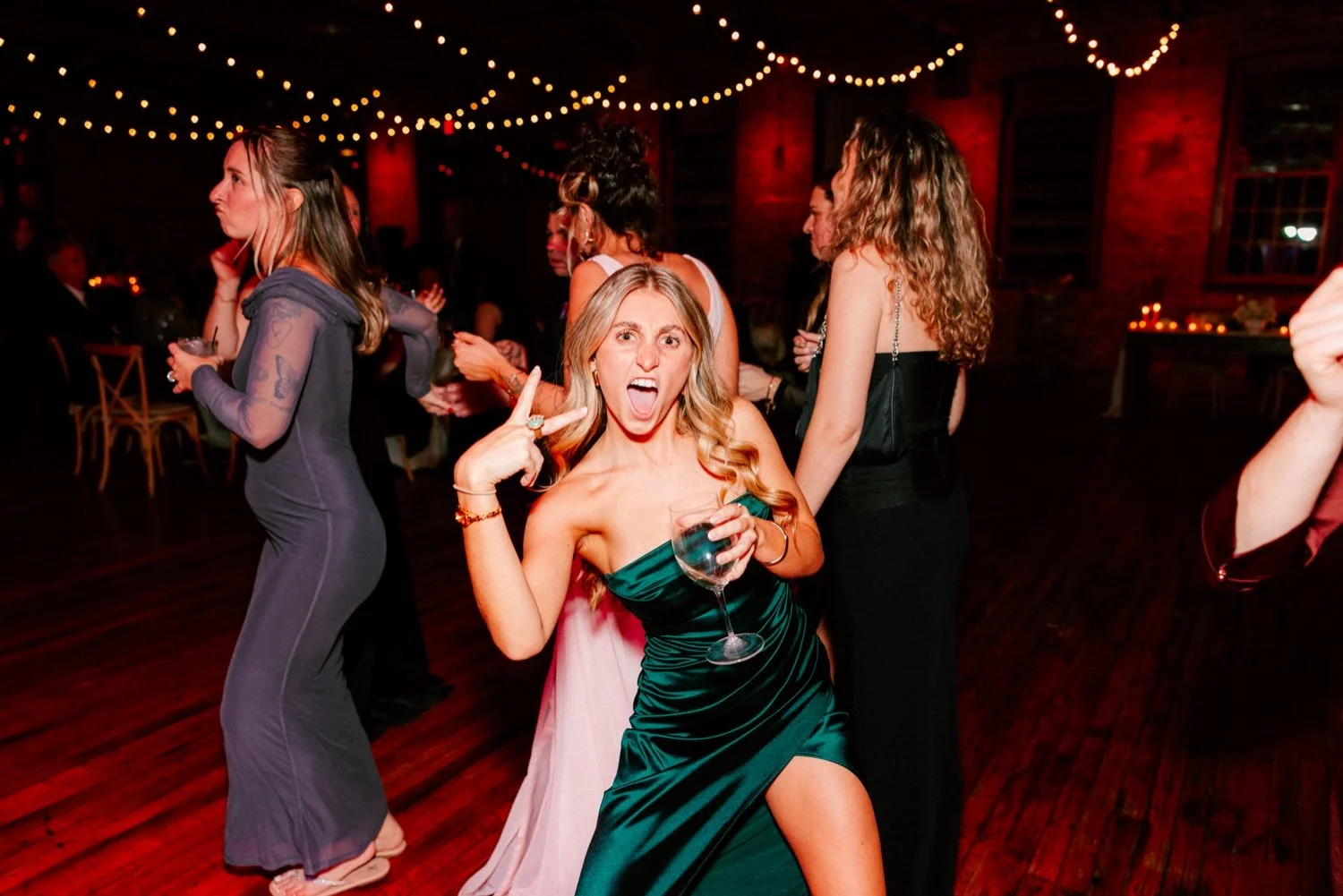  photo of guest who caught the bouquet posing at city winery hudson valley 