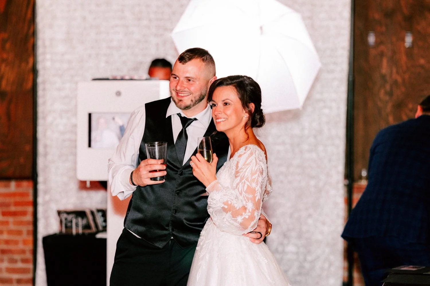  wedding couple pose for guest during reception at city winery hudson valley 