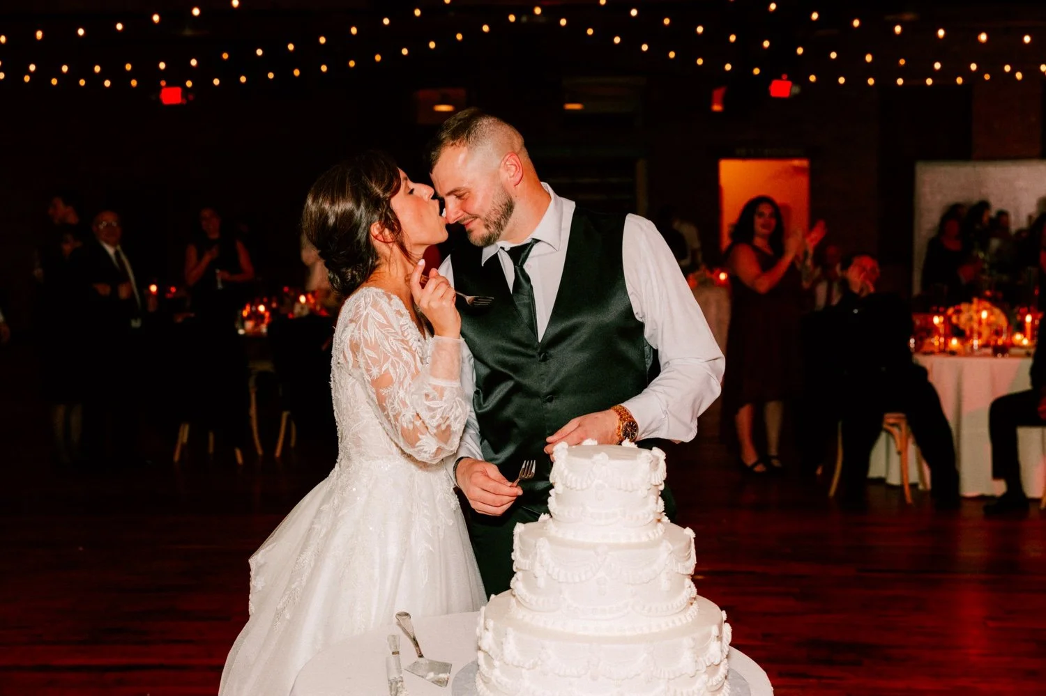  bride licks frosting off the grooms nose at city winery hudson valley 
