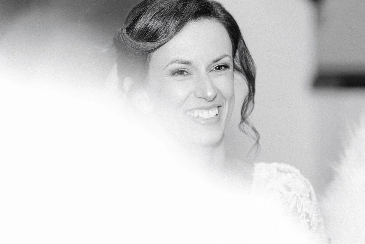  bride smiling before walking down the aisle 
