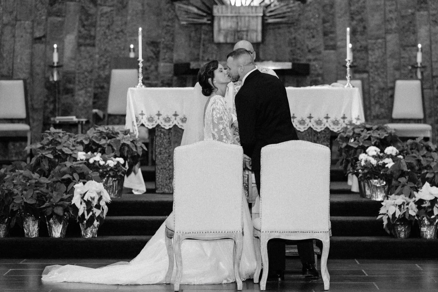  wedding couple share first kiss during church ceremony in newburgh ny 