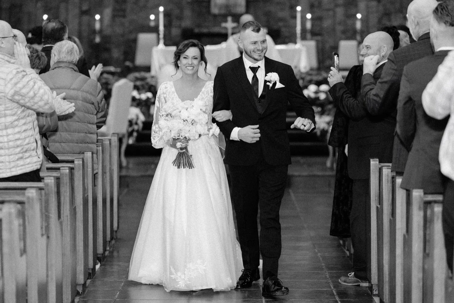  bride and groom walking down aisle just married at church in newburgh ny 