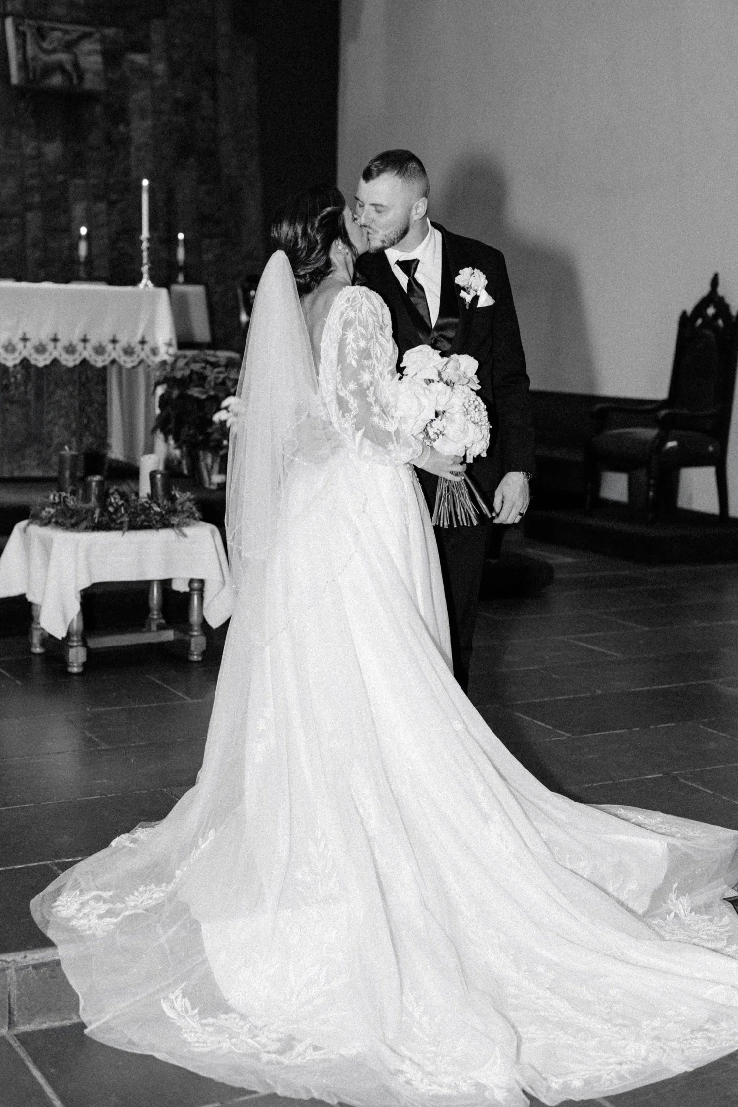  bride and groom kiss timeless wedding portrait 