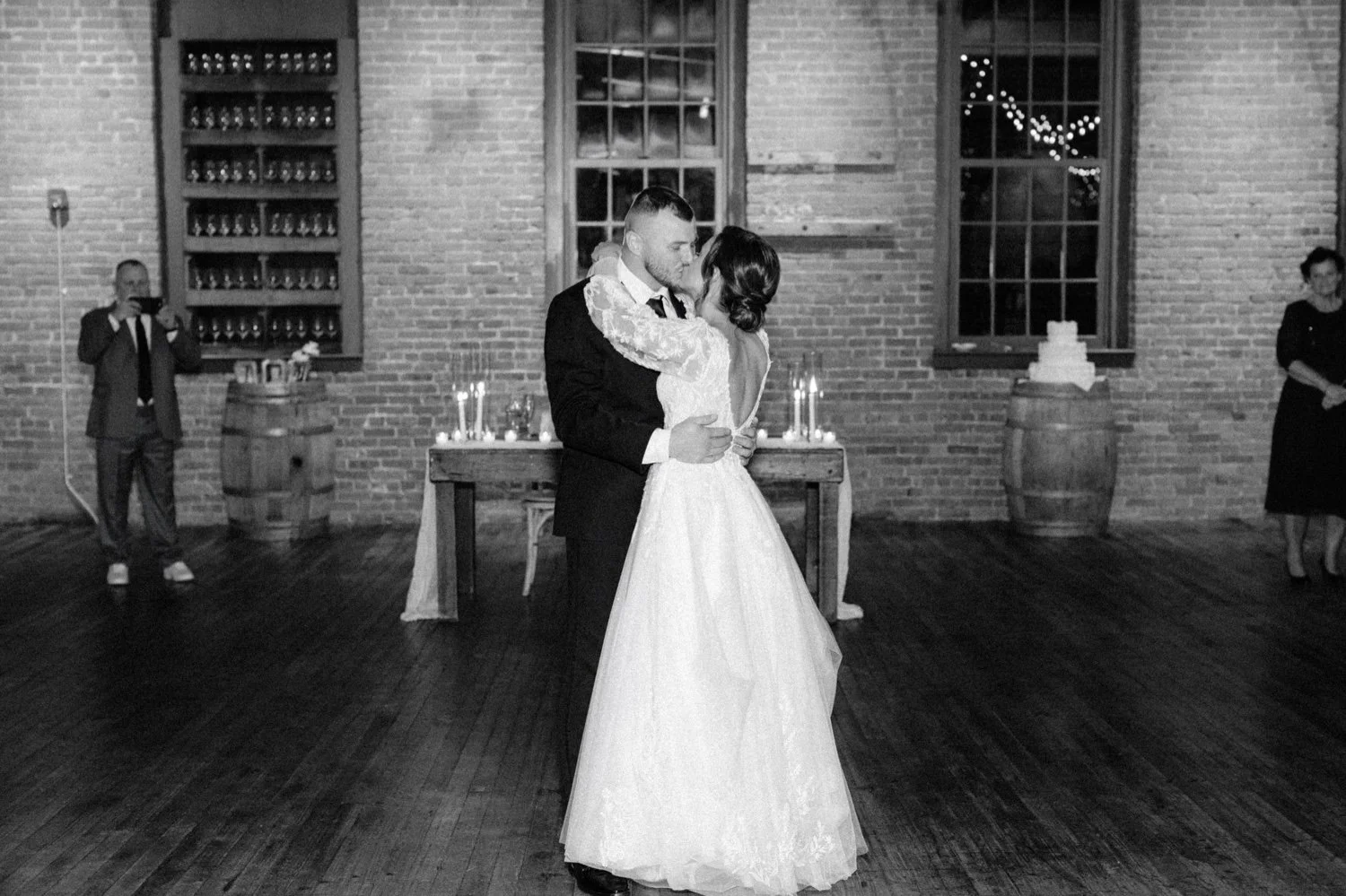  wedding couple kiss during their first dance at city winery hudson valley 