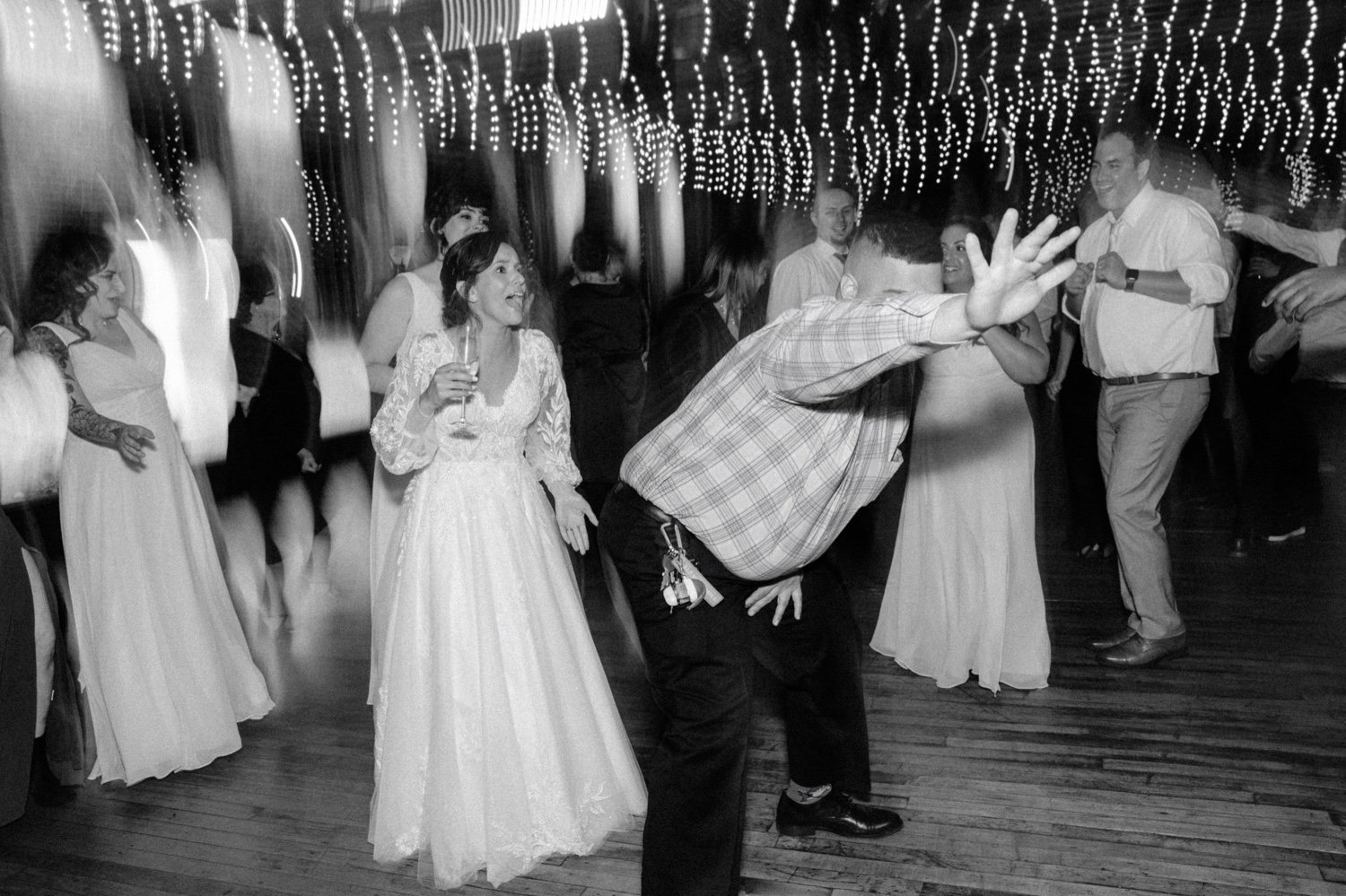 guests rubs his butt on the bride during her wedding reception at city winery hudson valley 