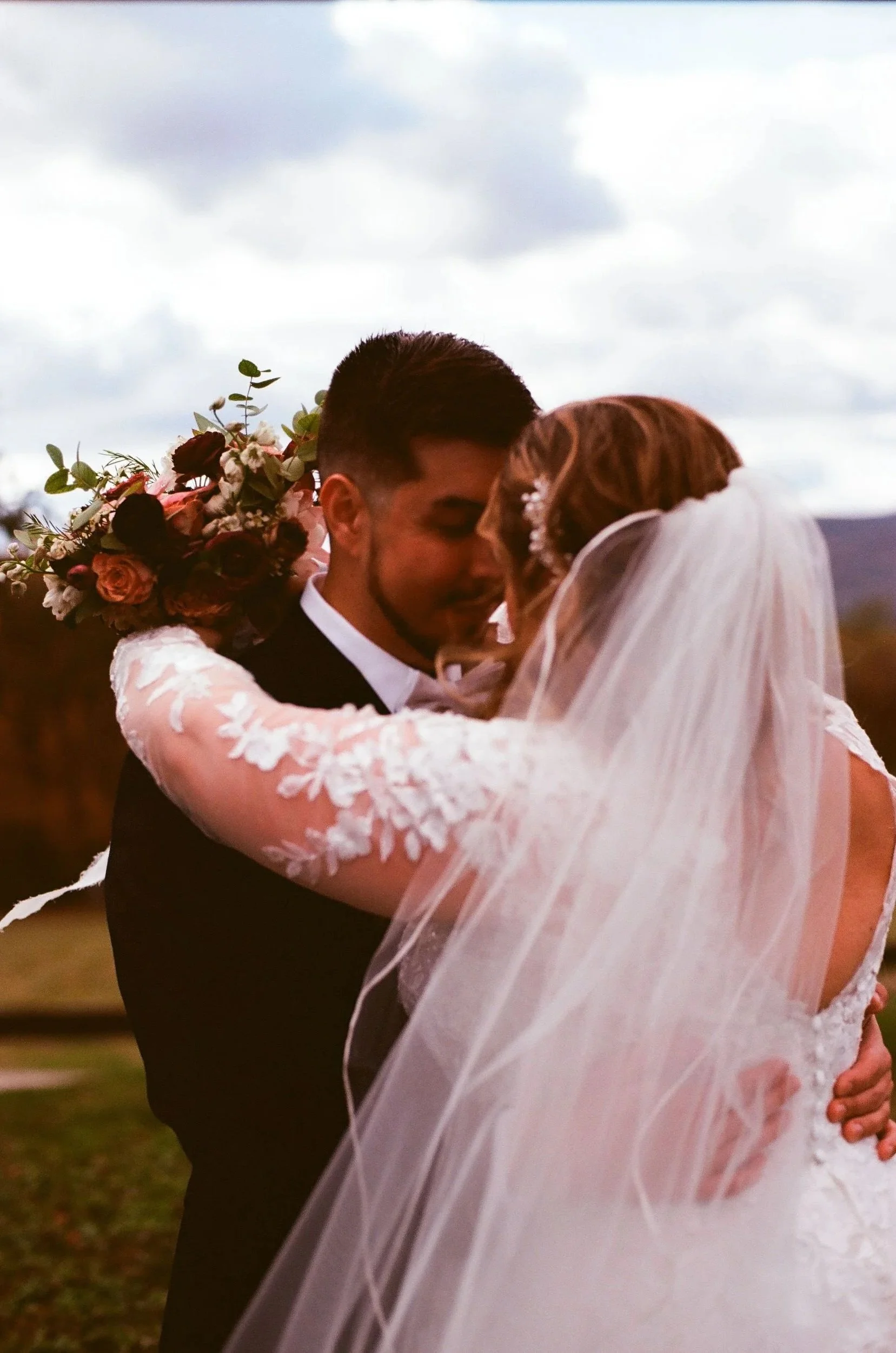 Color film photographs from their wedding day.