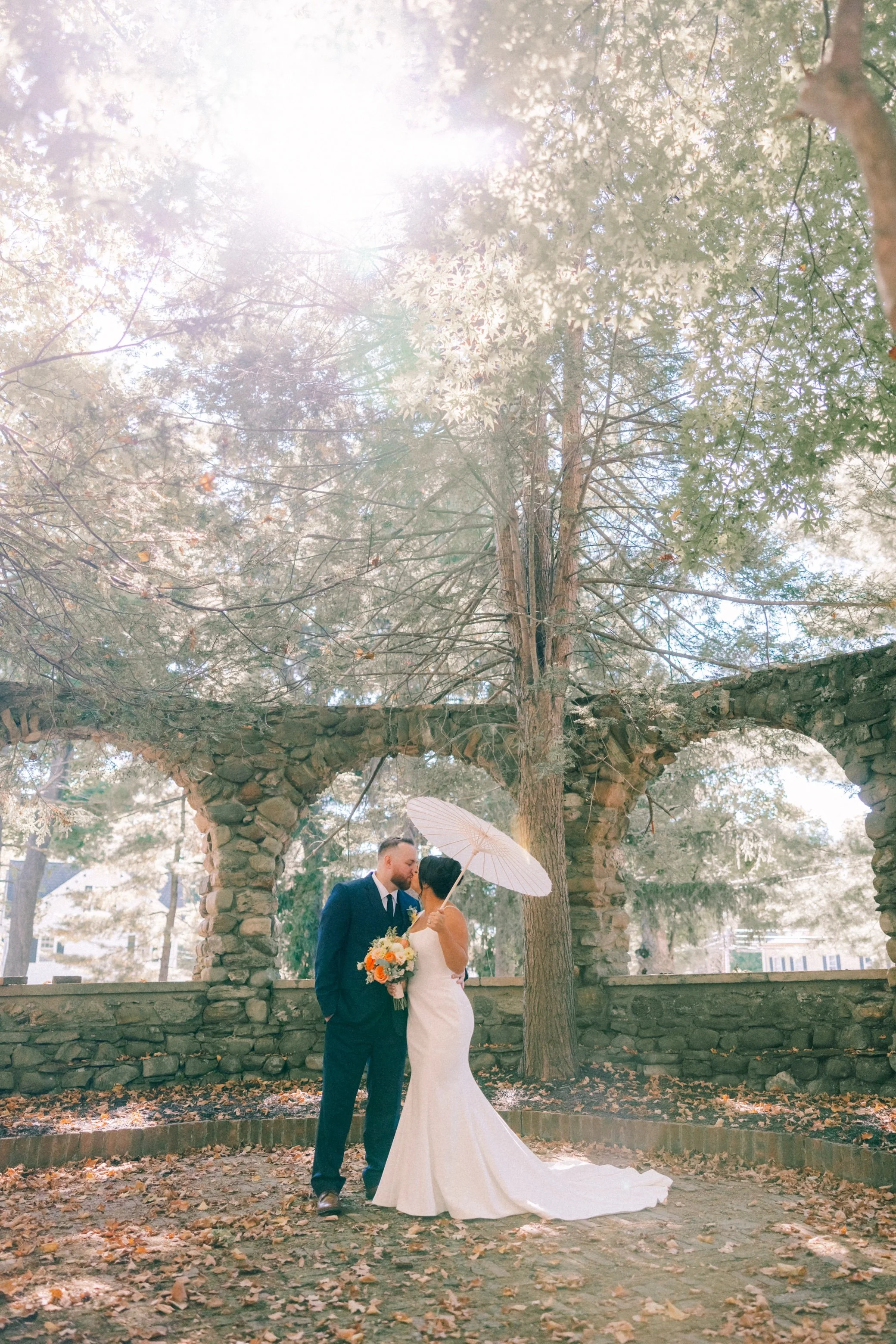  wedding photograph with parasol at brotherhood winery 
