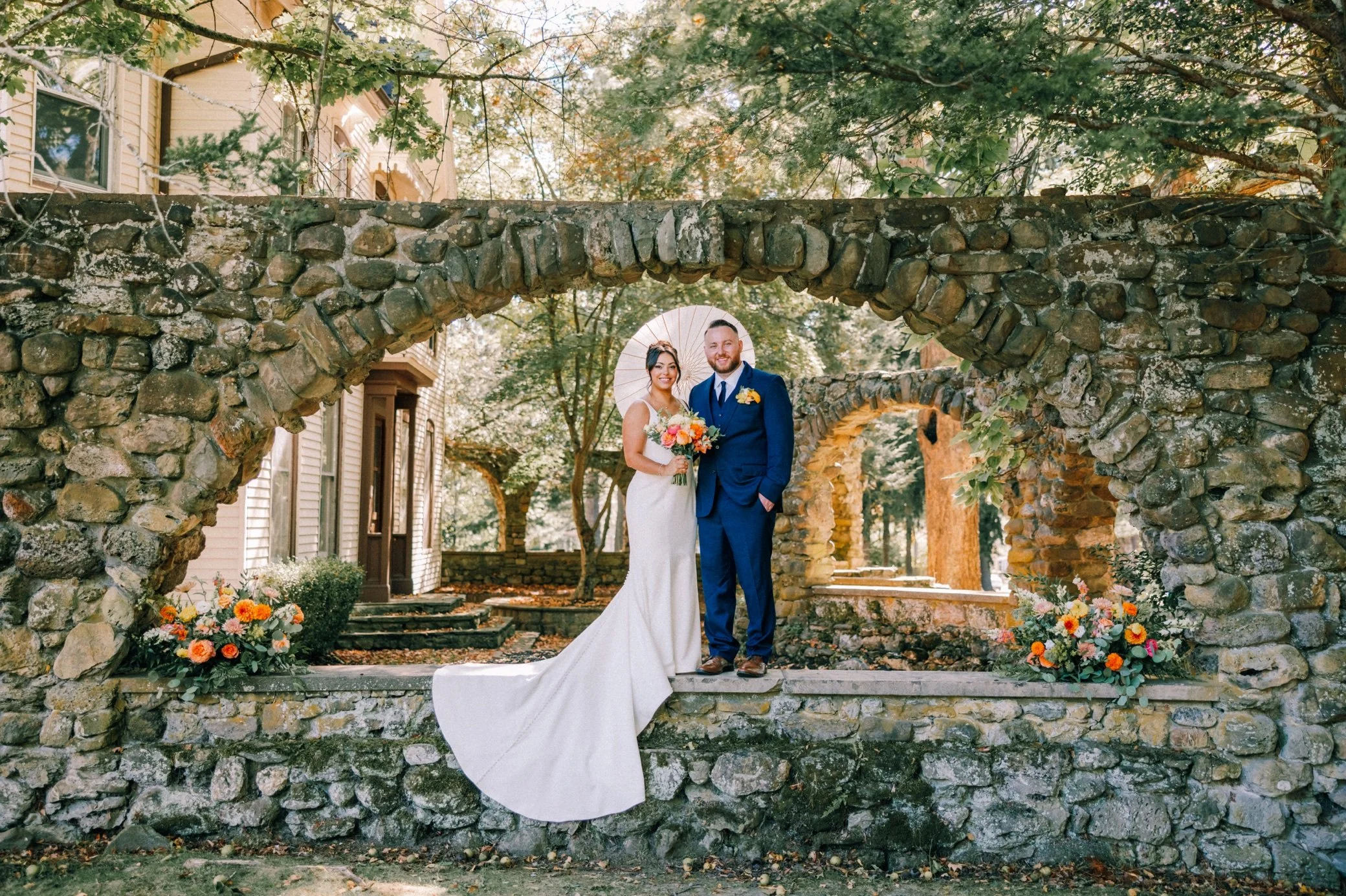  wedding photograph of couple under arch at brotherhood winery 