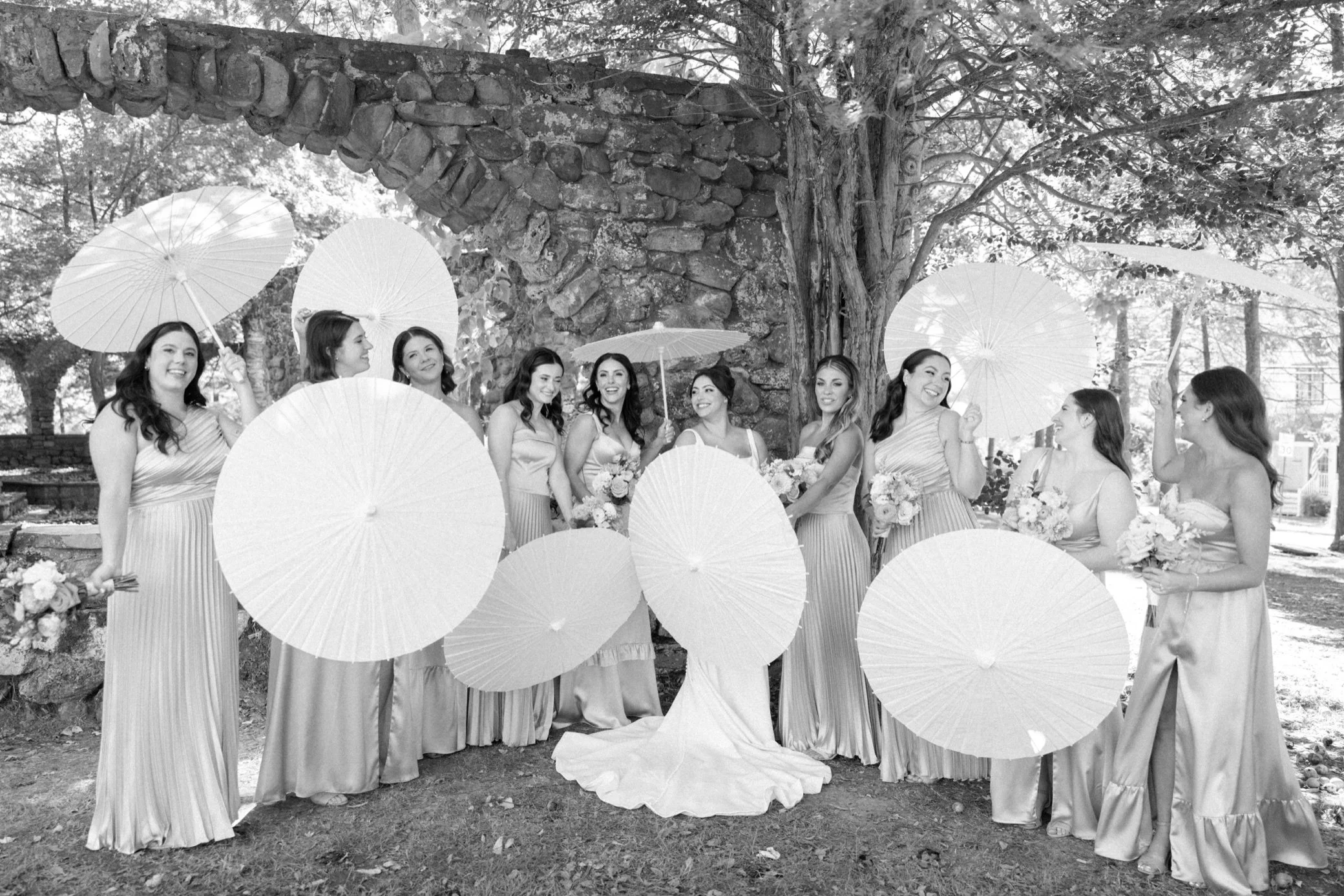  photograph of bridesmaids with parasols at brotherhood winery 