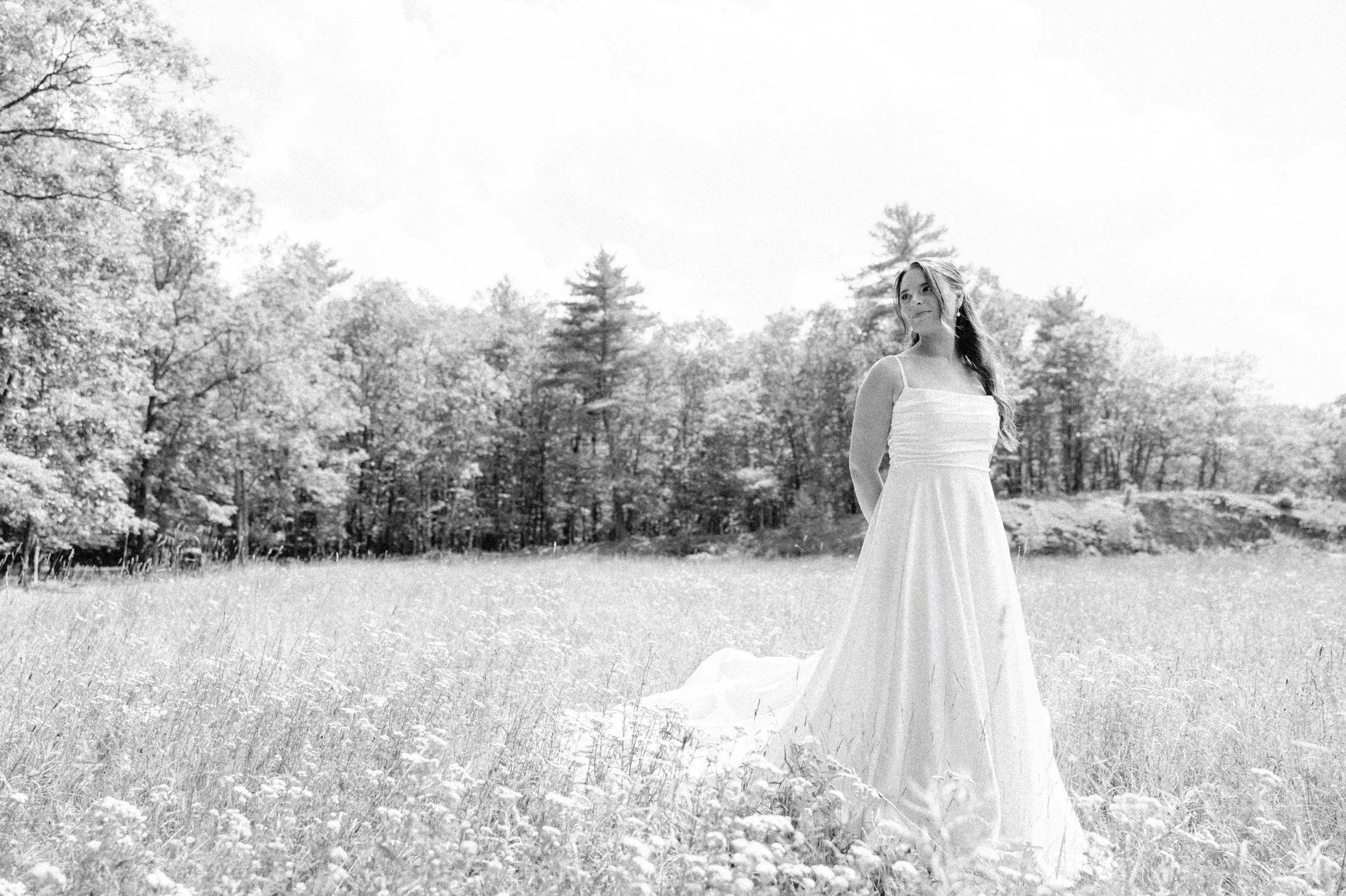  Timeless black and white wedding photo of the bride in the wildflower field at Gather Greene   