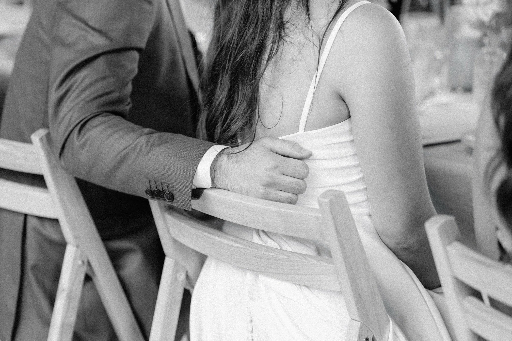  Black and white film photograph of a quiet moment during a Hudson Valley wedding at Gather Greene 