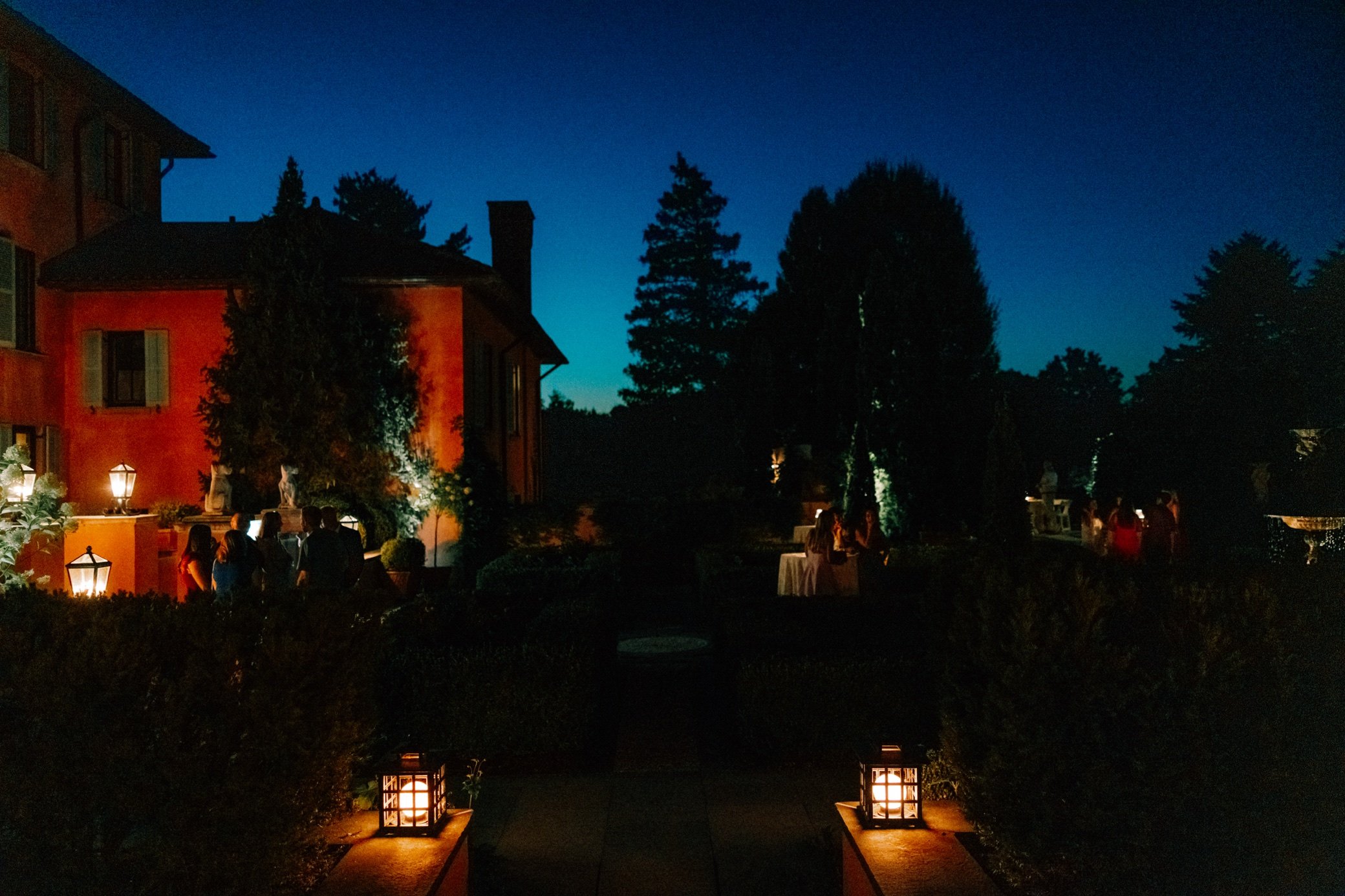  night photograph of glenmere mansion formal garden 