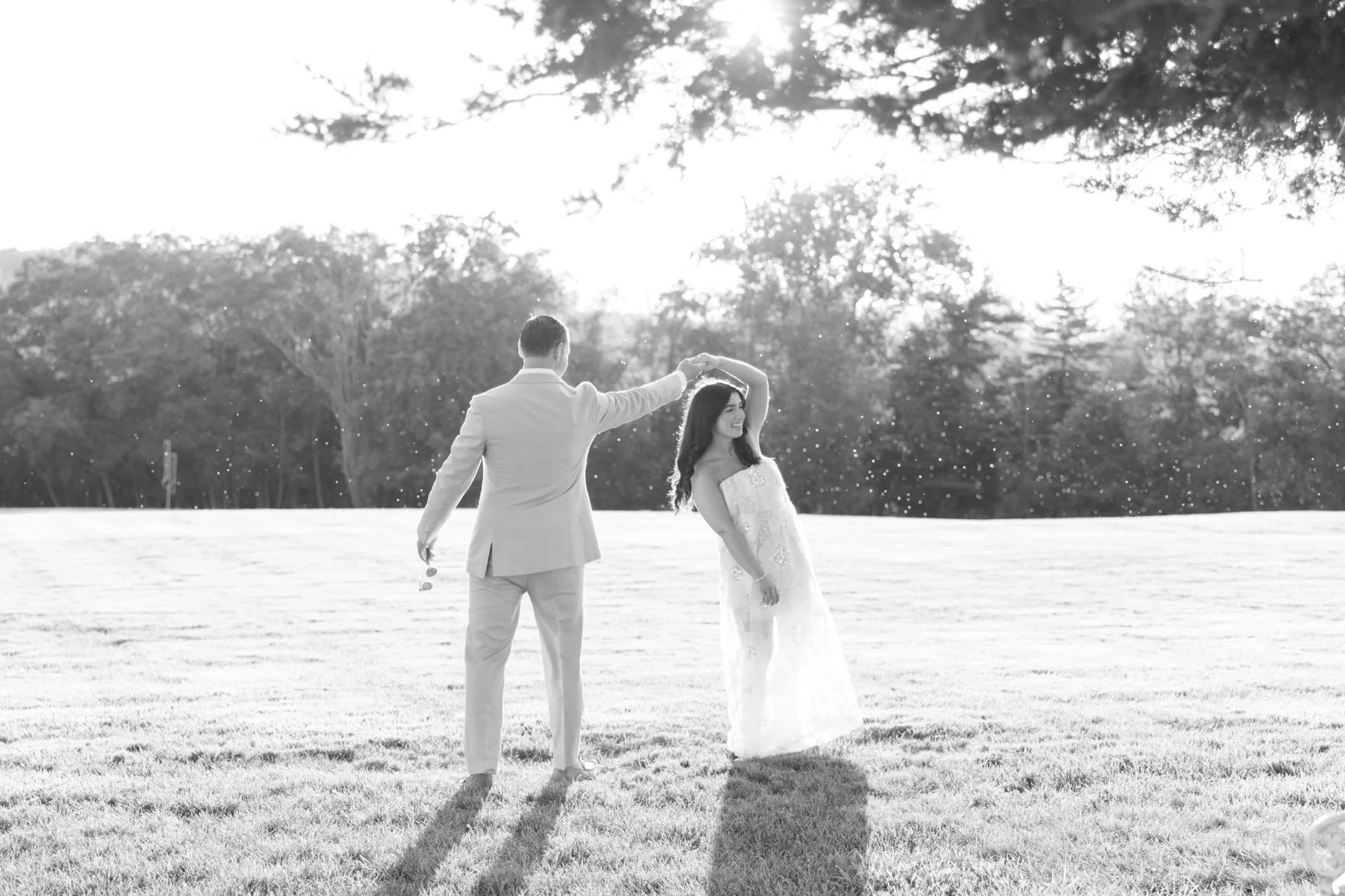  timeless black and white wedding photographs of couple in a field at glenmere mansion 
