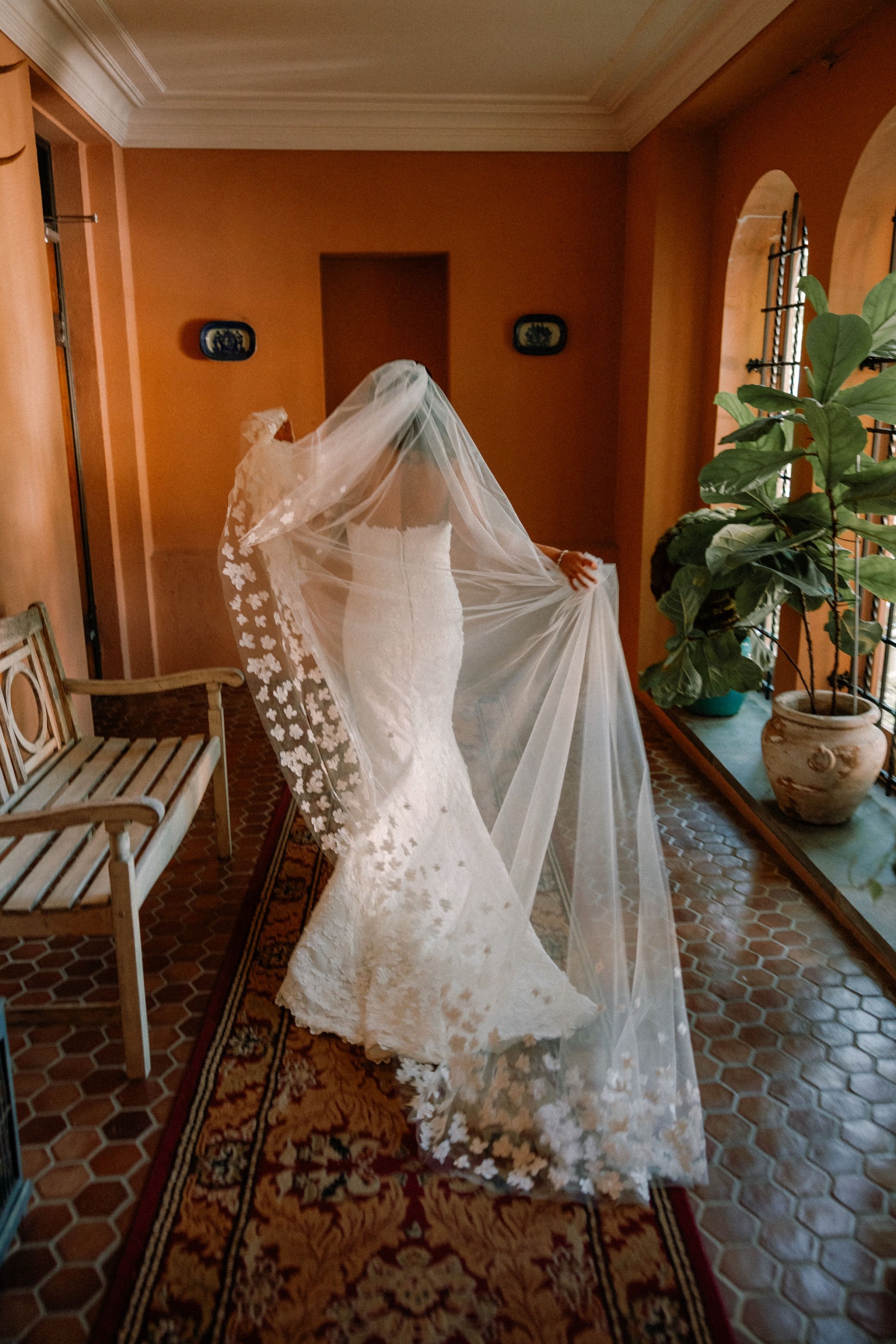  bride walking through glenmere mansion 