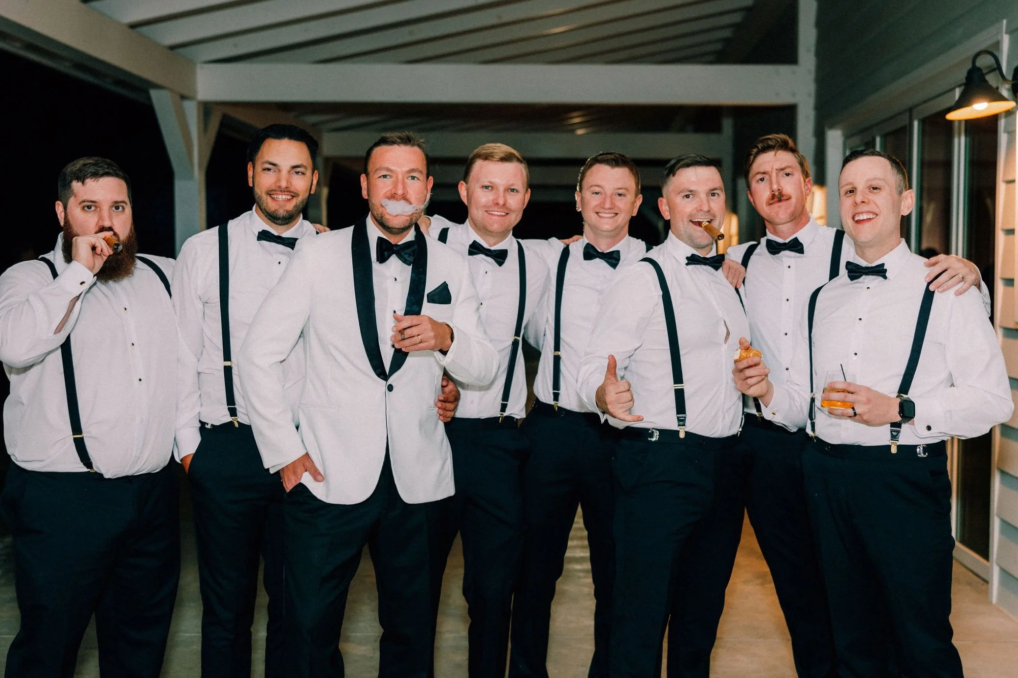  groomsmen with cigars at glenmere mansion 