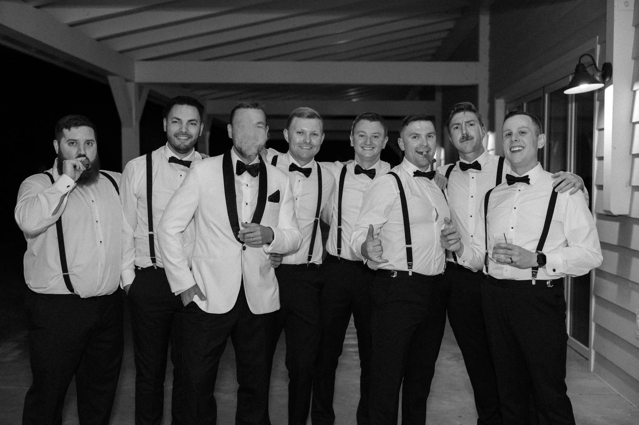  groomsmen with cigars at glenmere mansion by hudson valley wedding photographer 