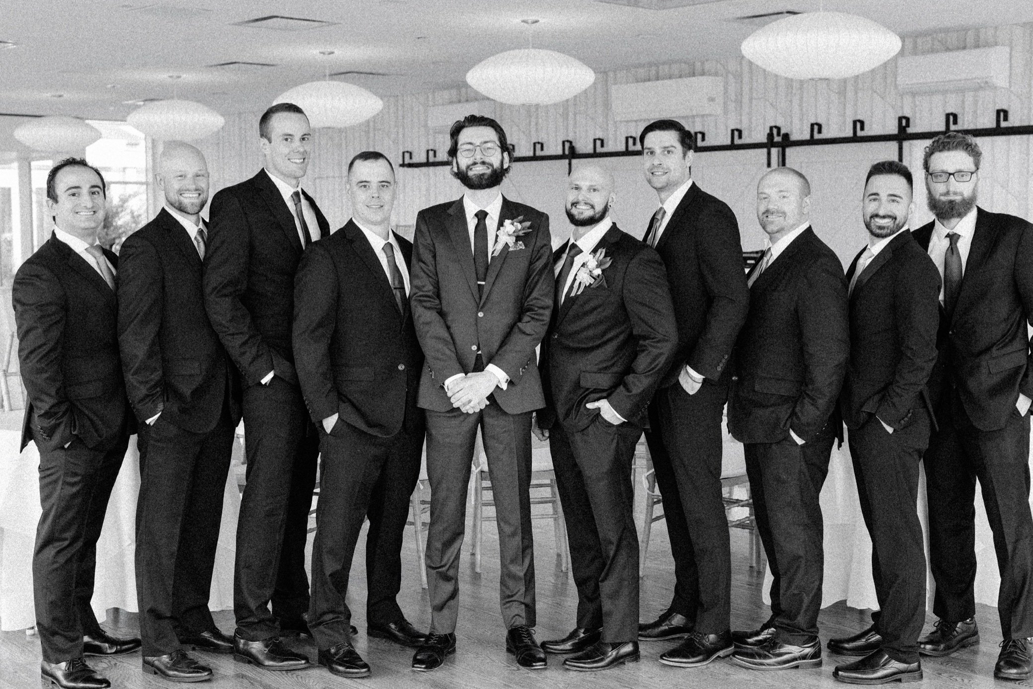  groomsmen getting ready at the garrison 