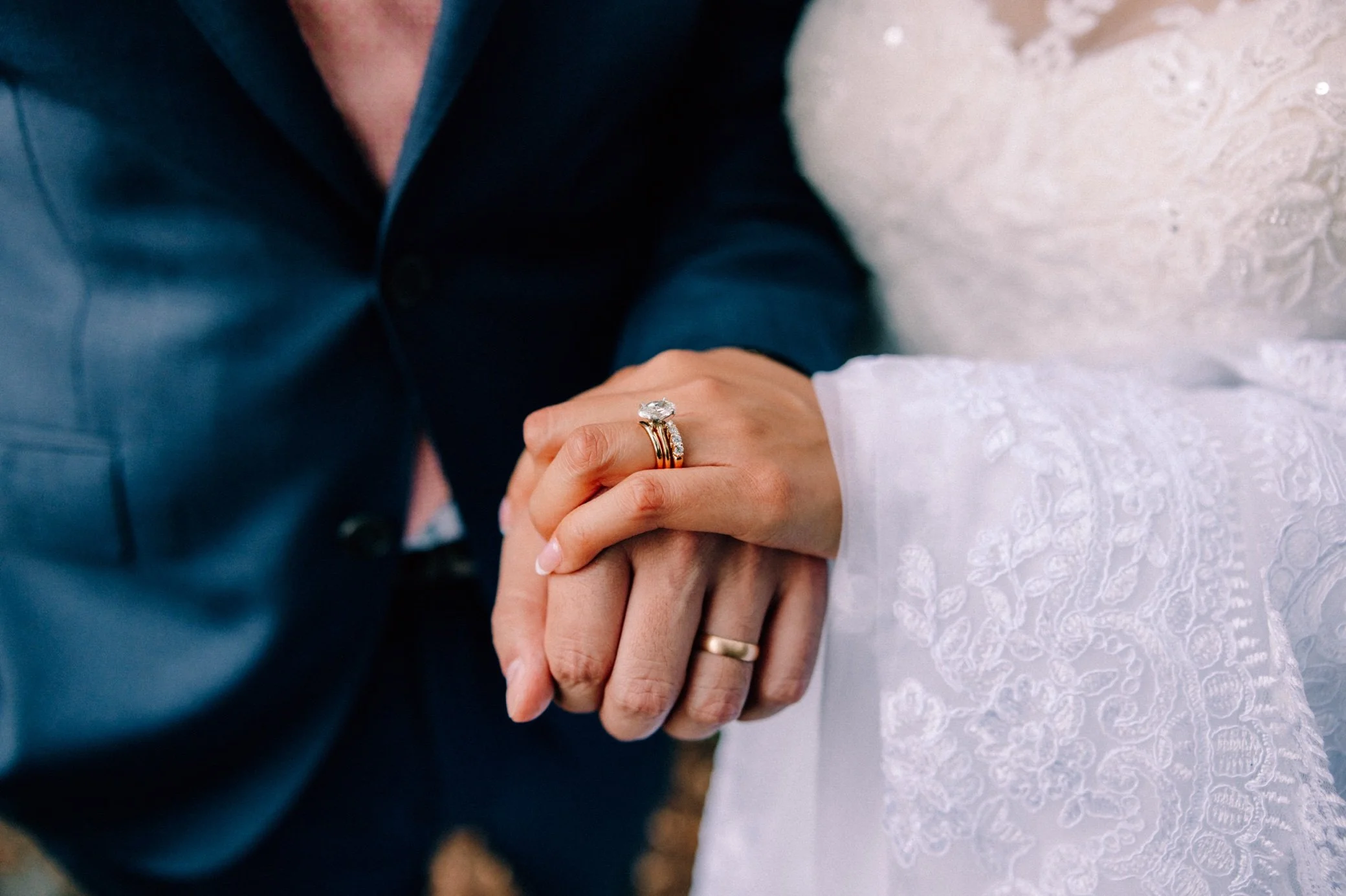  elopement photography of wedding rings at untermyer gardens 