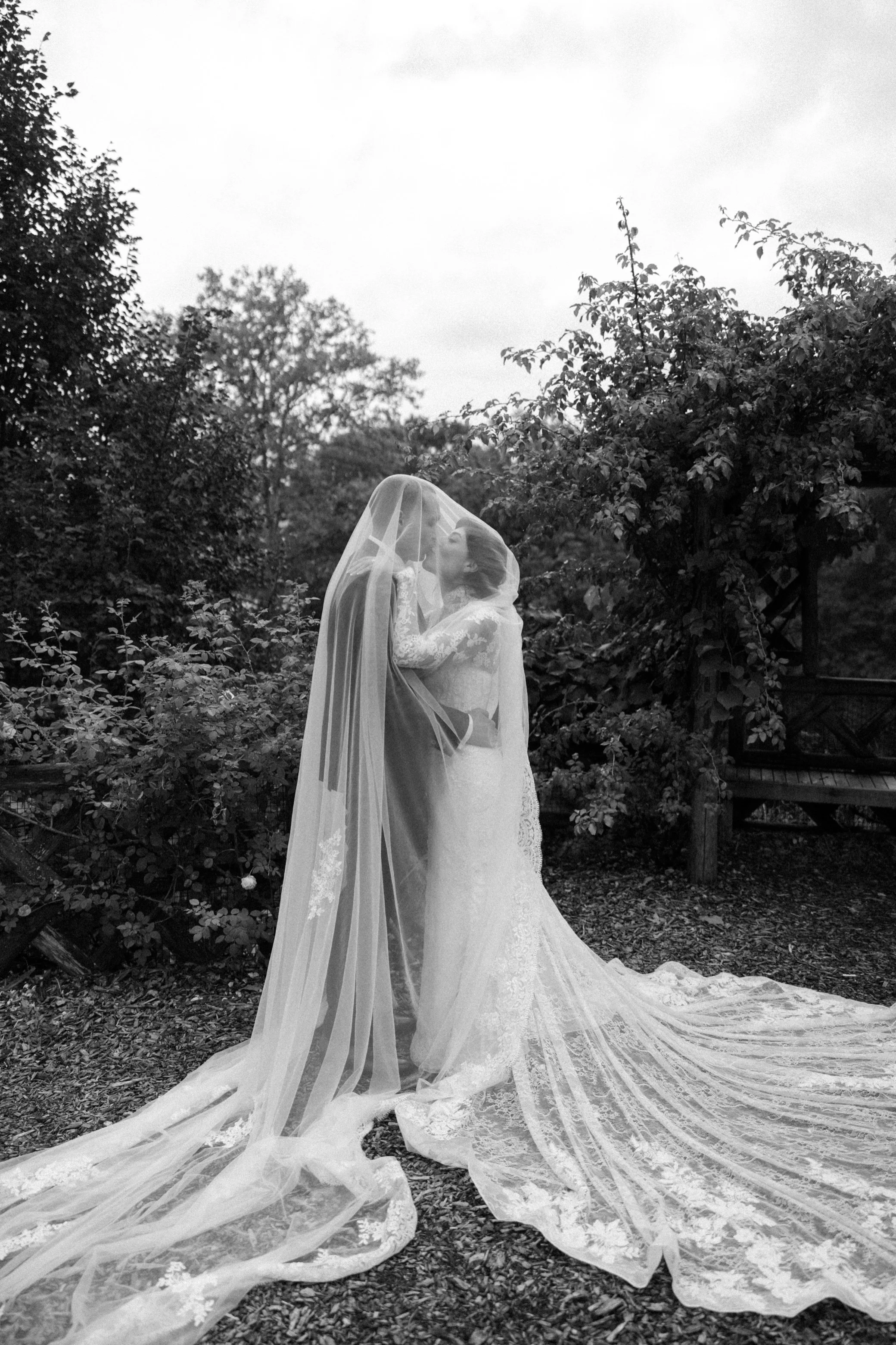  elopement intimate wedding photograph of couple under veil in the hudson valley at untermyer gardens 