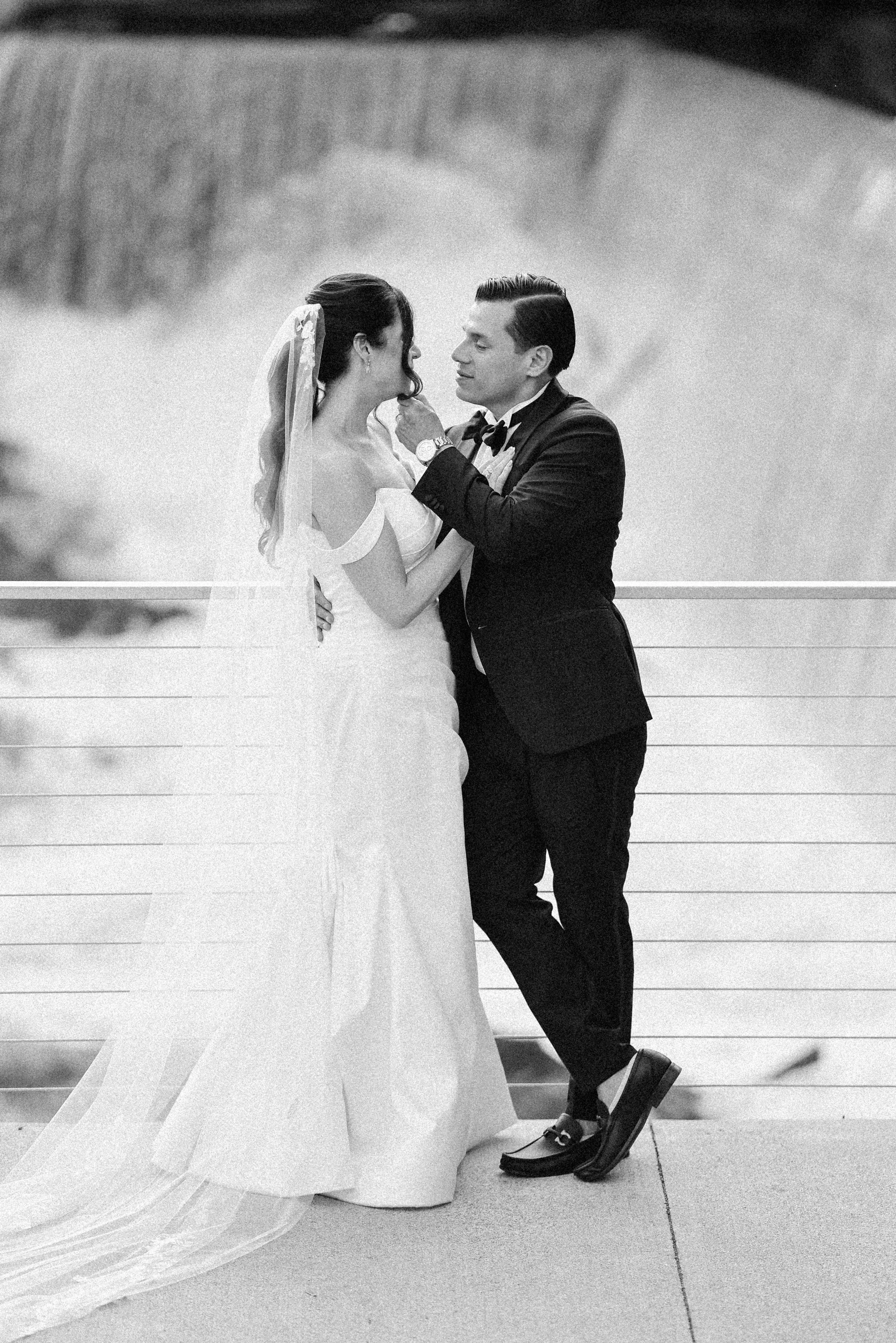  film photograph of hudson valley wedding couple in front of waterfall at the roundhouse  