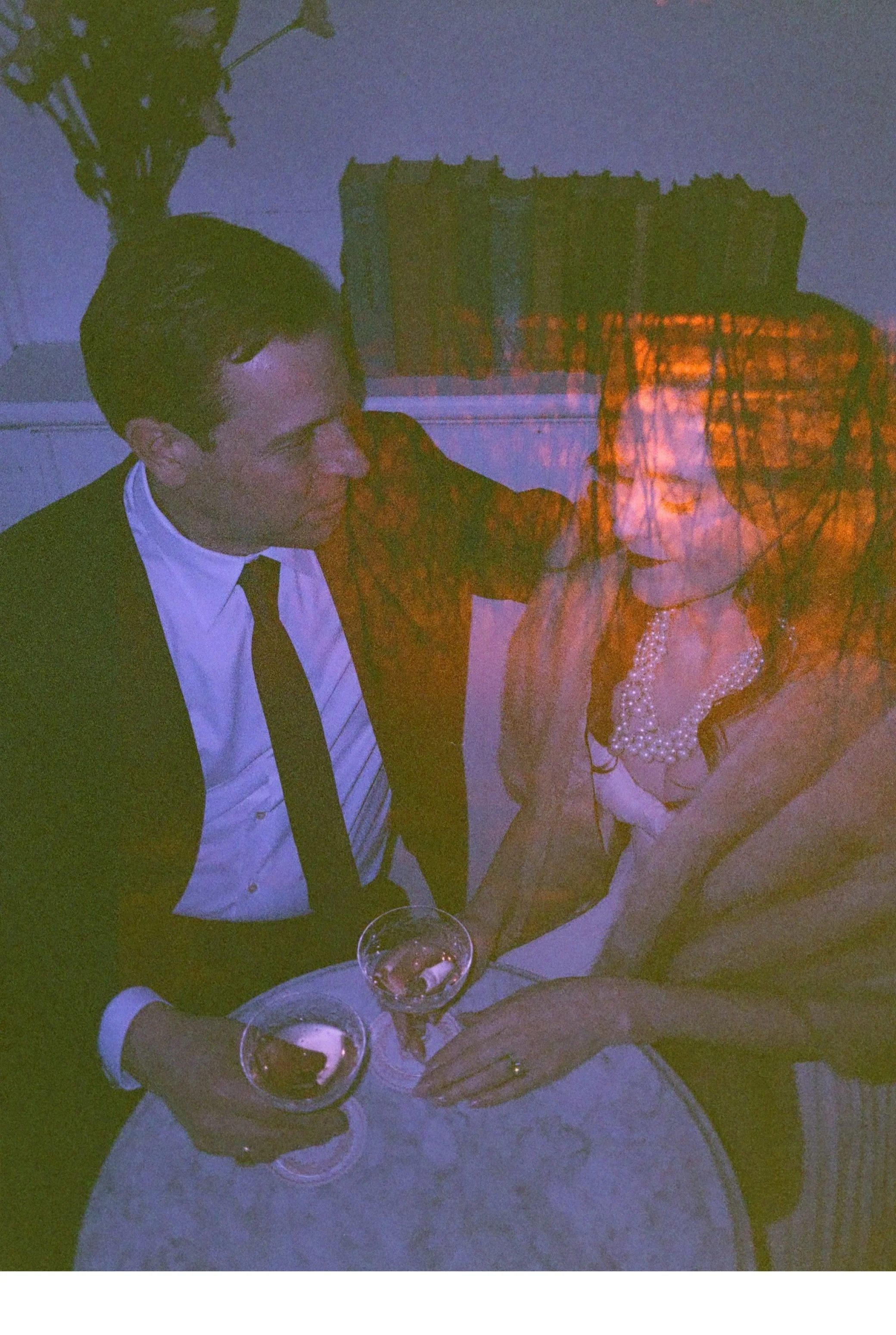  vintage color film photography by caitlinn mahar-daniels during indoor engagement shoot at brunette wine bar 