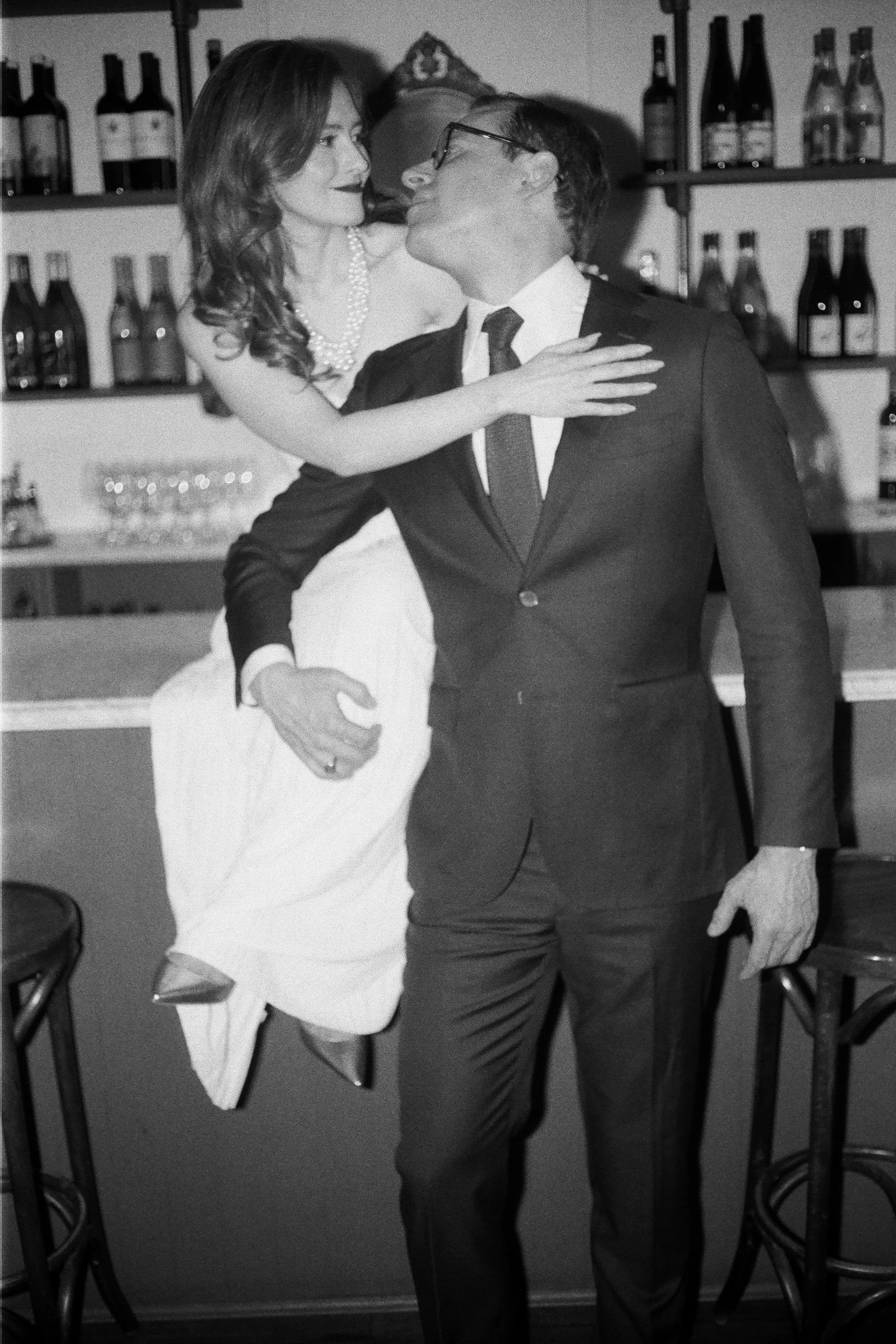  old hollywood inspired flash film photography during engagement shoot in brunette wine bar in kingston, ny 