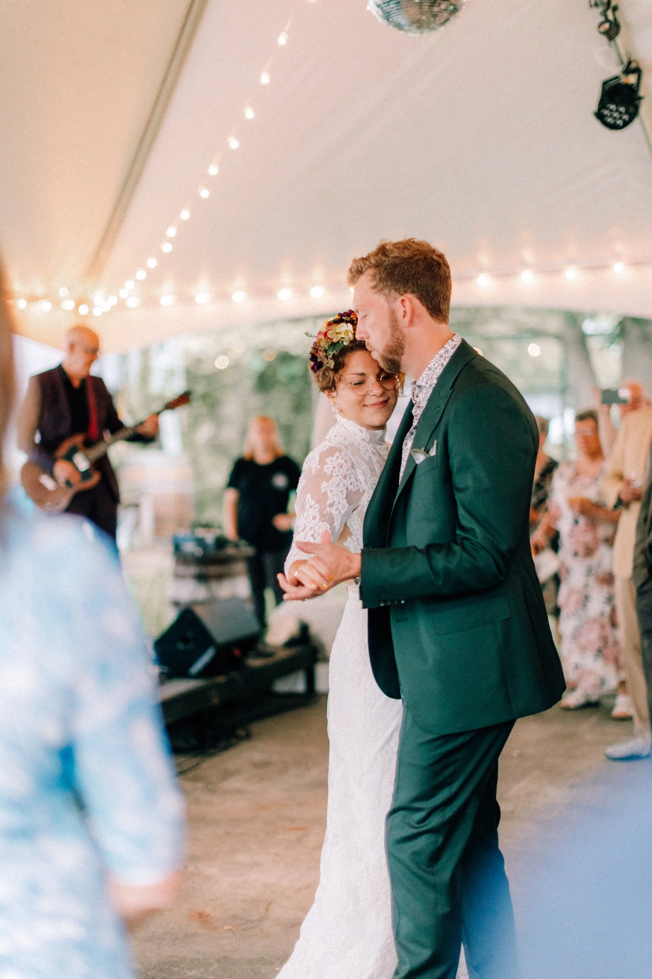  bride and groom dancing under cocktail hour tent at the yard in beacon, ny 