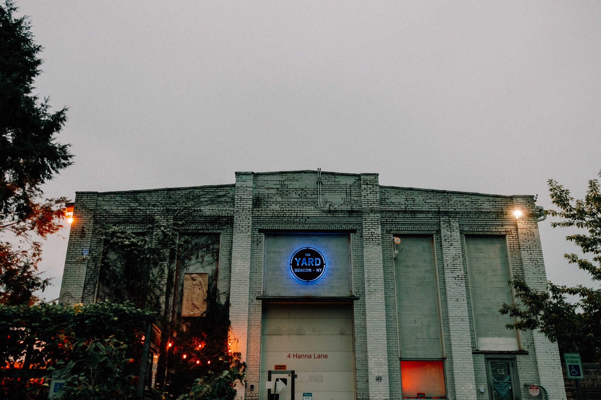  exterior night photograph of the yard wedding venue in beacon, ny 