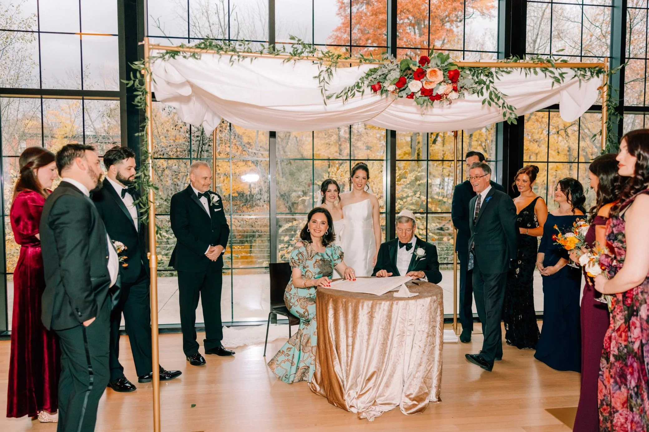 parents and bridal party witness ketubah signing at the roundhouse 