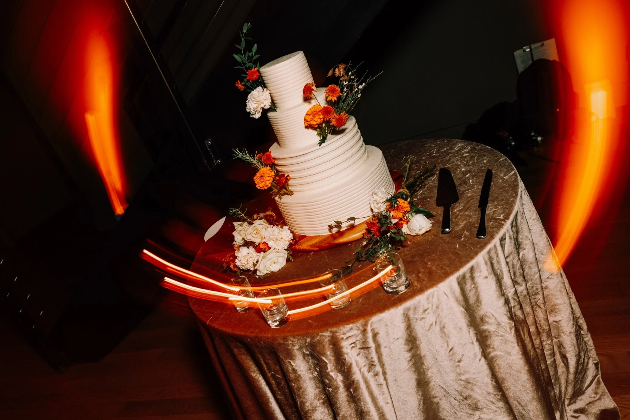  wedding cake and candles at the roundhouse 