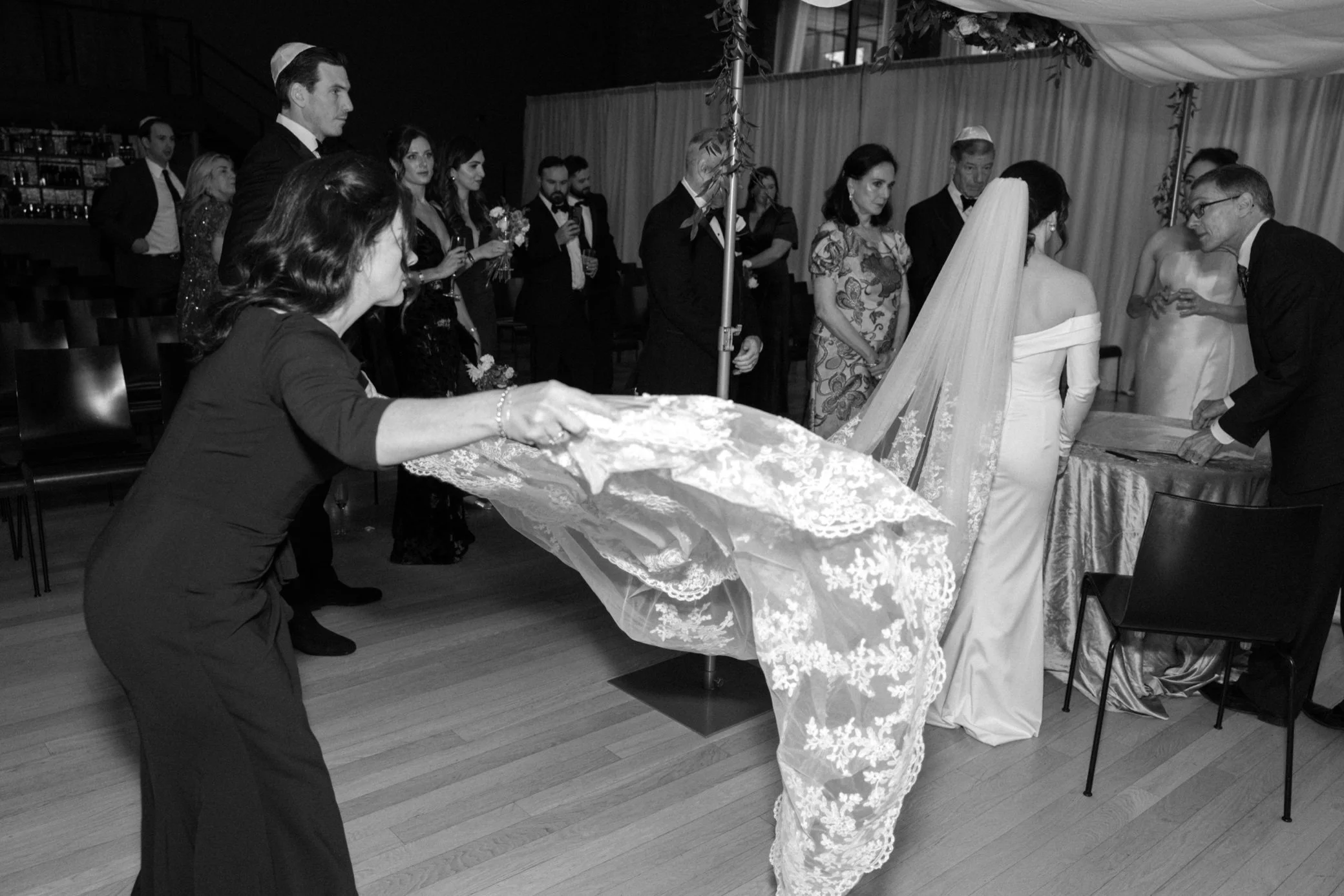  bride’s mom fixes brides veil during ketubah signing at the roundhouse 