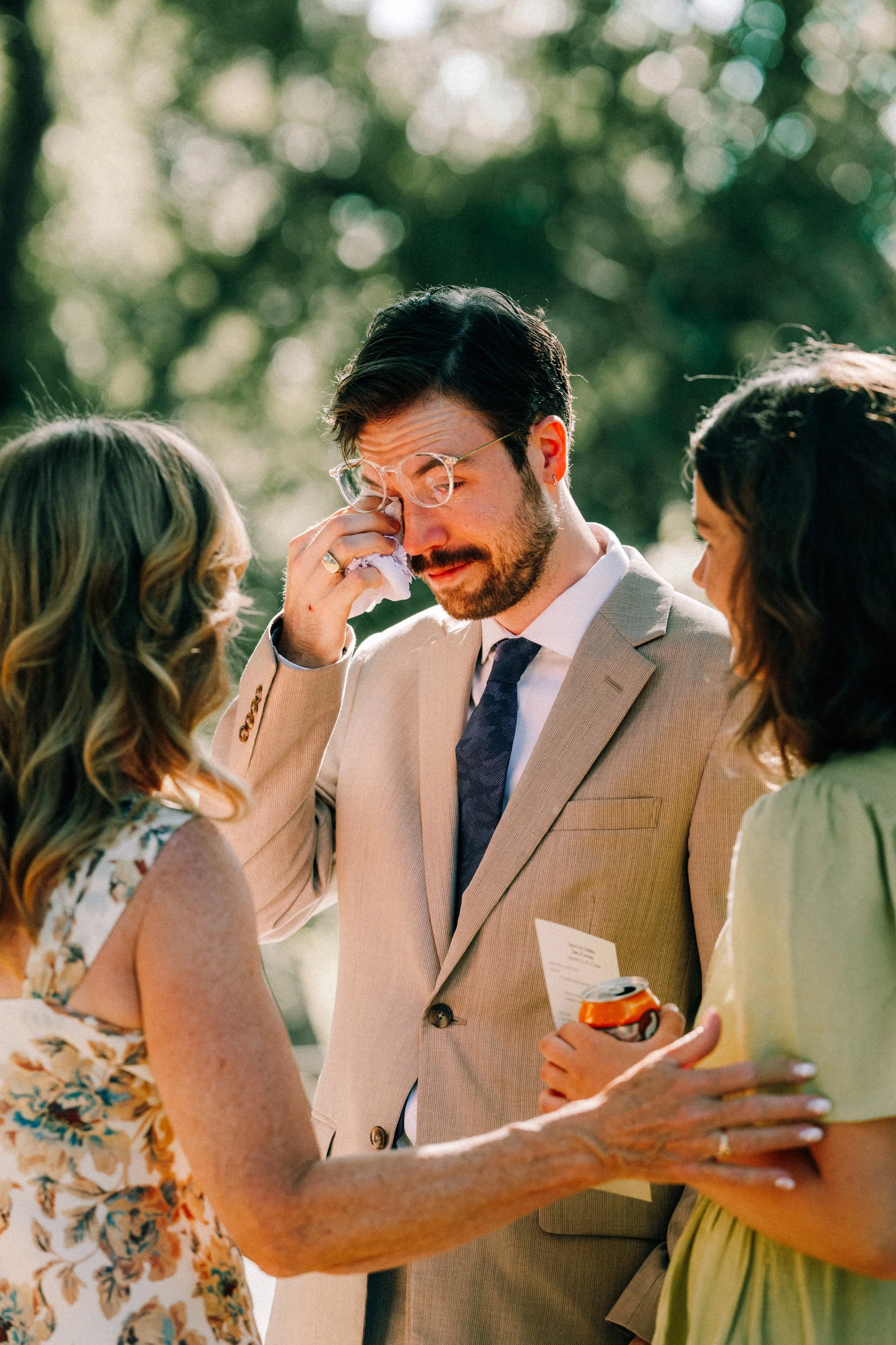 photograph of groom's brother crying after their wedding ceremony at The Yard in Beacon NY