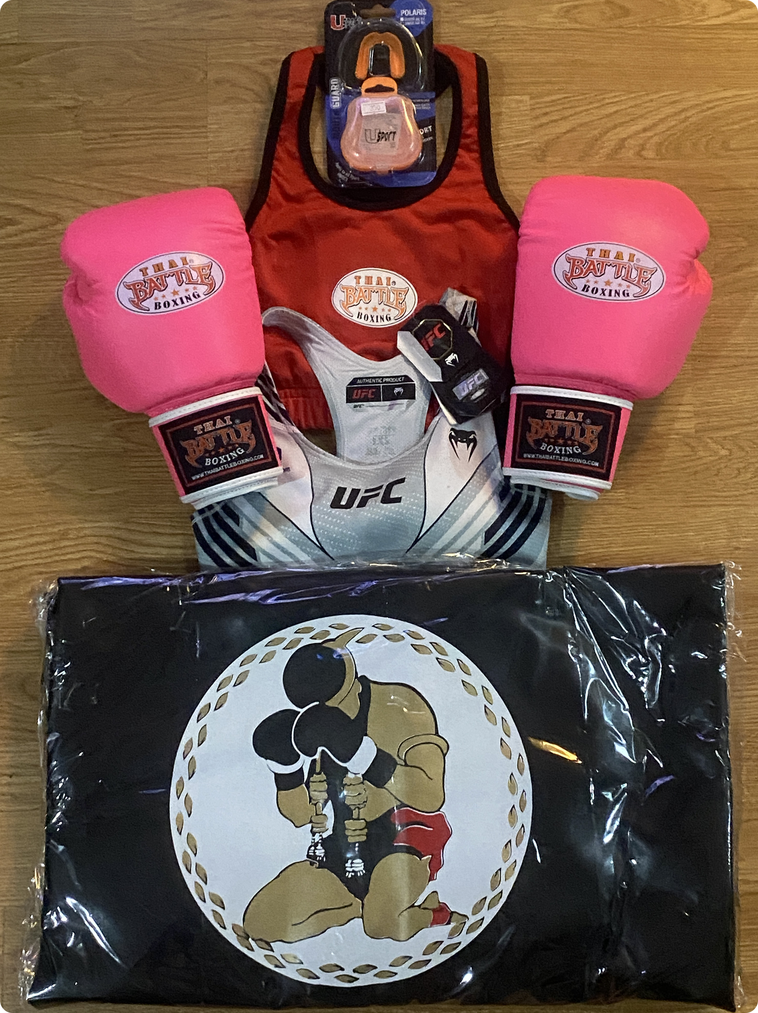 Gear Donation By providing essential equipment like gloves, pads, and especially a durable punching bag for the coach Deerlet Black Eye , we empower gyms to offer consistent, quality training sessions. This not only helps develop athletic skills but also fosters discipline, self-confidence , and a positive routine for the youth. Muay Thai training becomes an outlet where kids can channel their energy, learn respect, and stay engaged in something constructive.