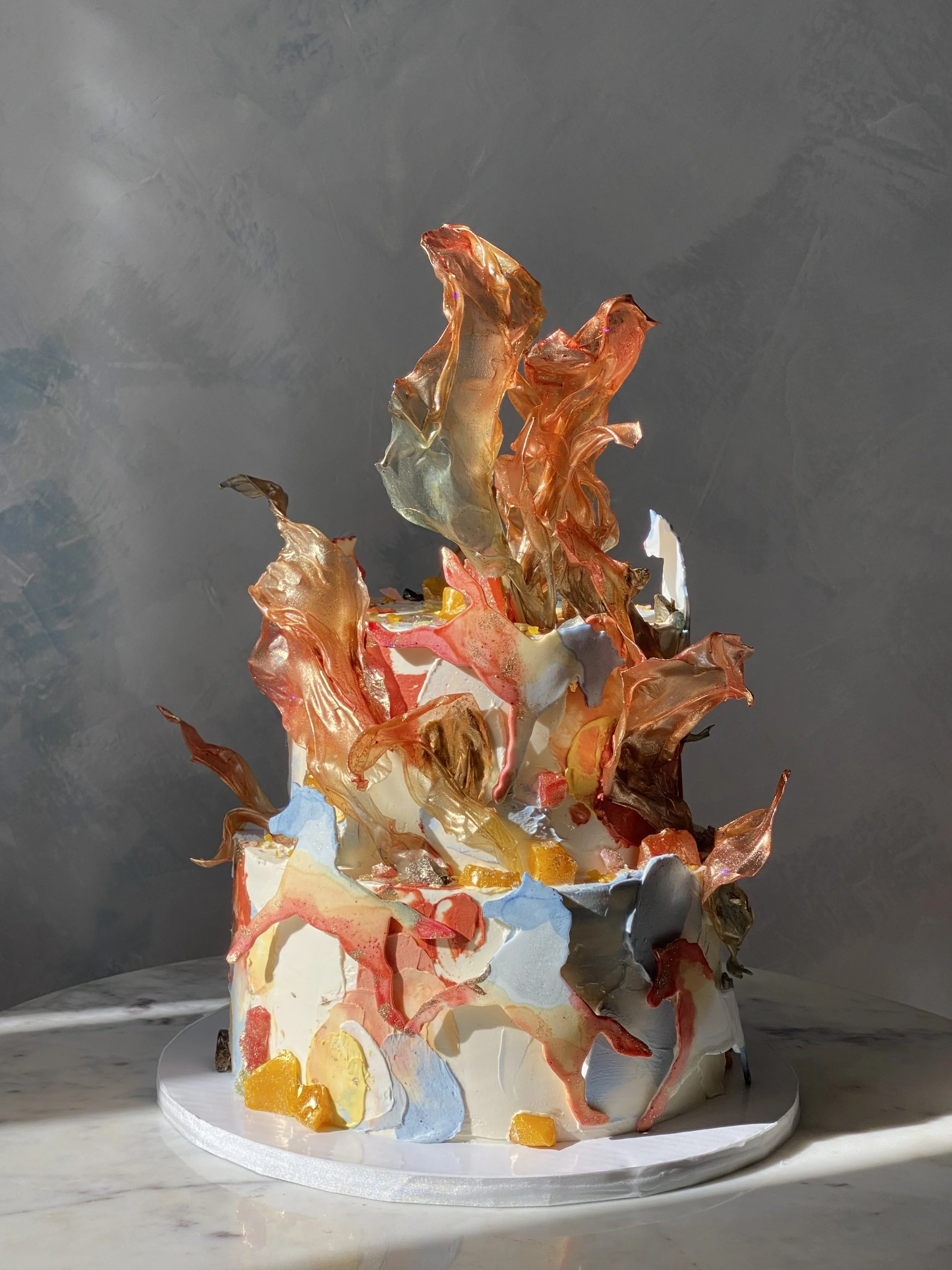 Year of the fire horse gluten-free cake with vibrant colors and handmade decor in NYC. 